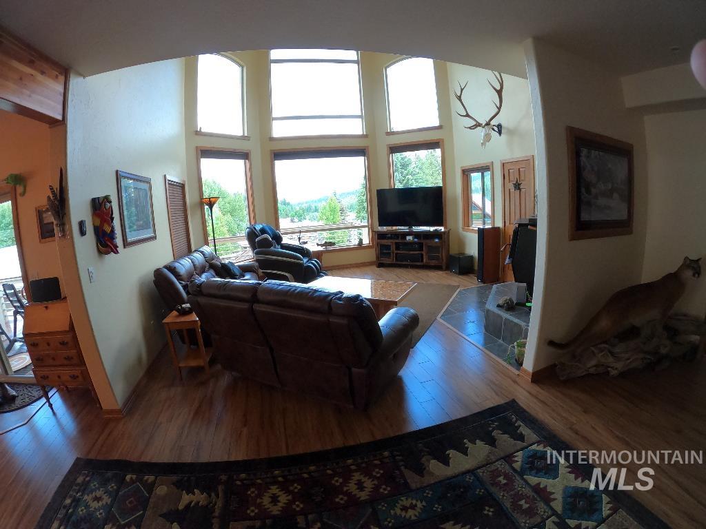 Living area featuring wood finished floors and baseboards