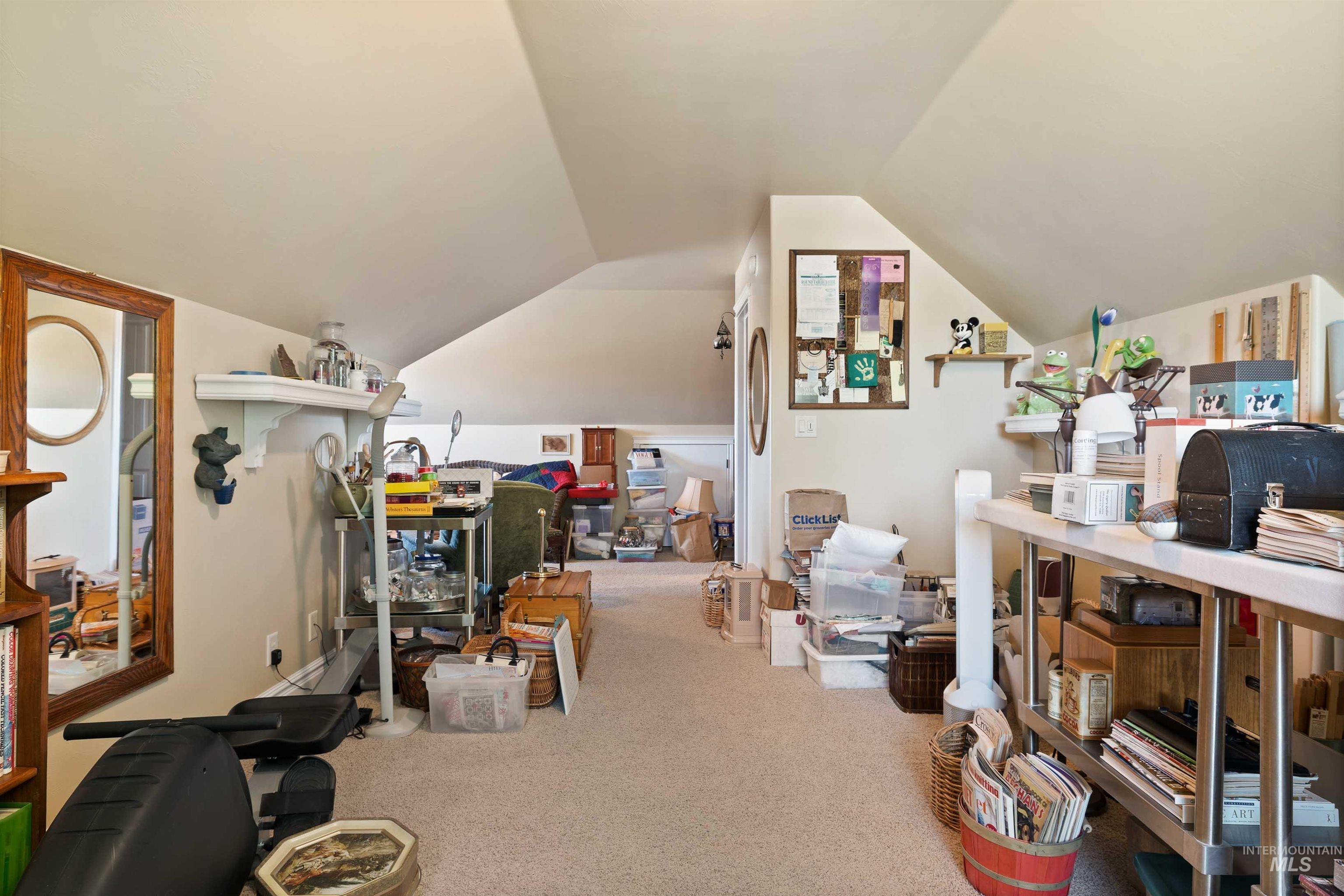 Bonus Room/4th Bedroom featuring carpet floors, lofted ceiling and a 1/2 bath