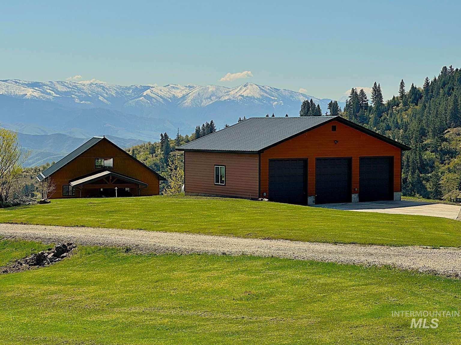 Detached garage with a mountain view