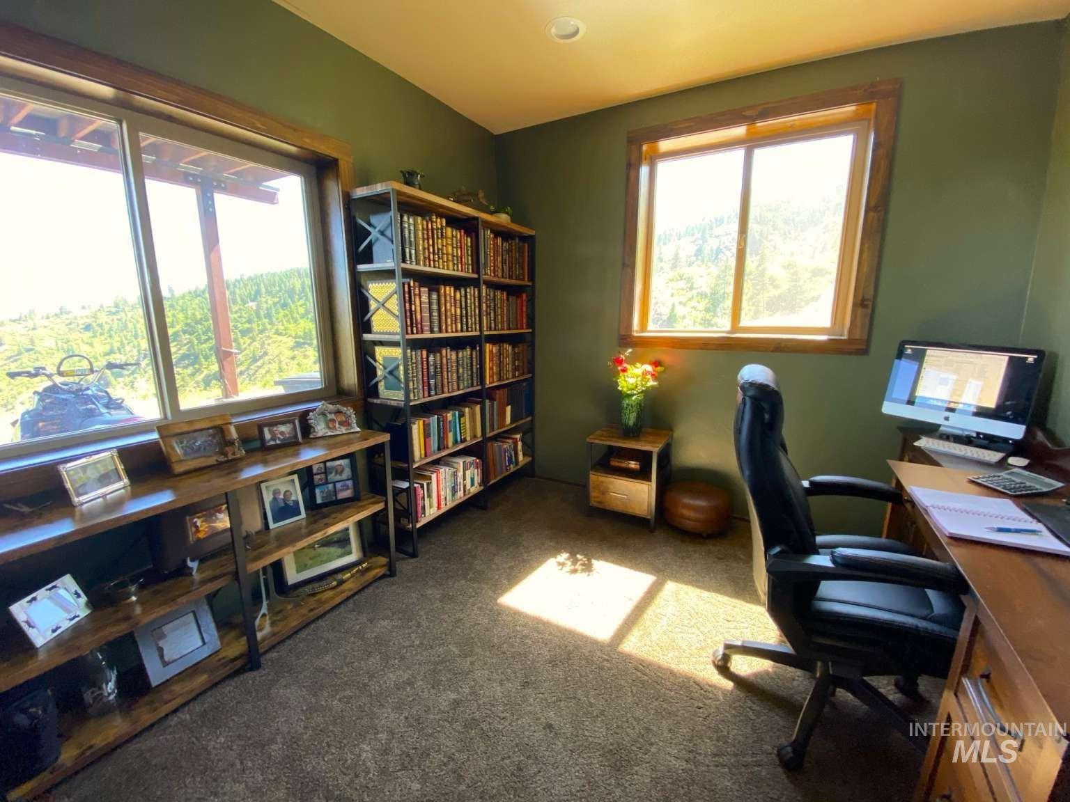 Office area featuring carpet floors
