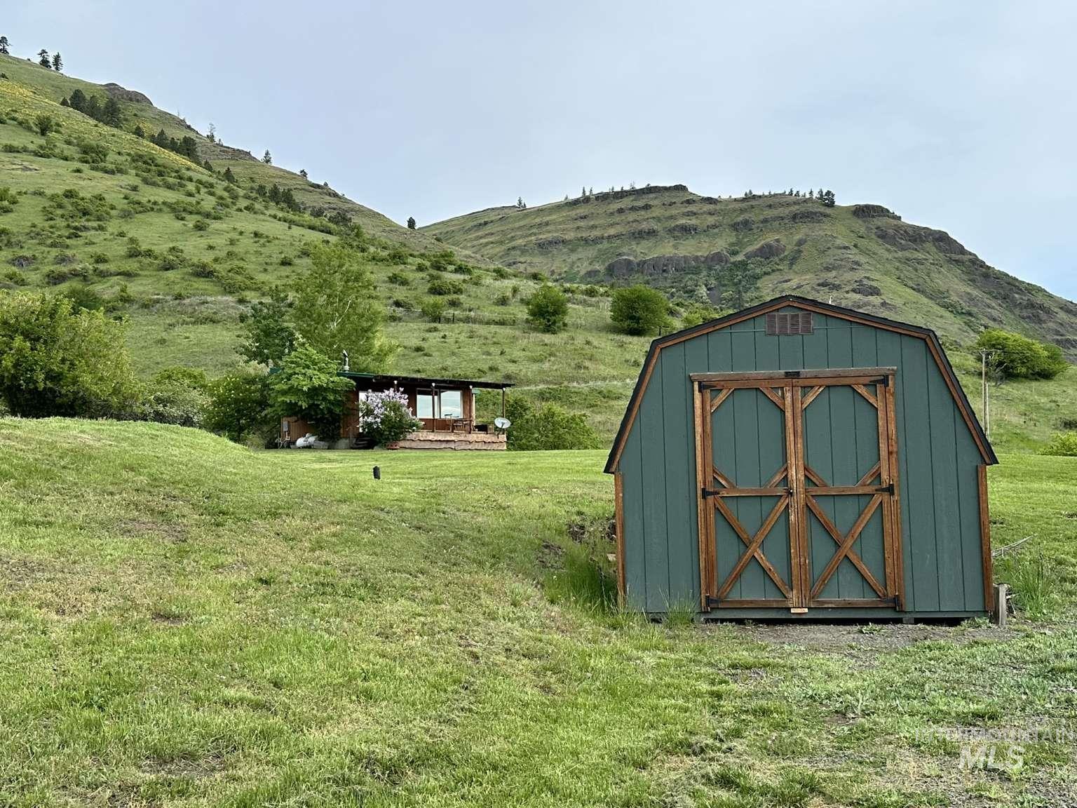View of shed featuring a mountain view