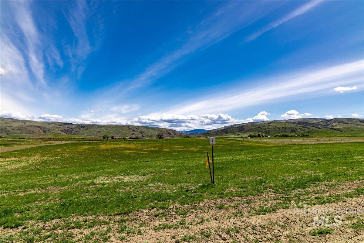 View of mountain background featuring rural landscape and a pastoral area
