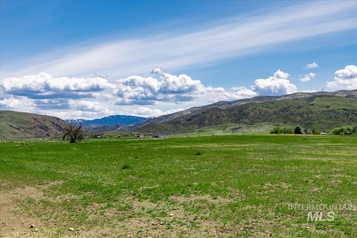 View of mountain background with rural landscape and a pastoral area