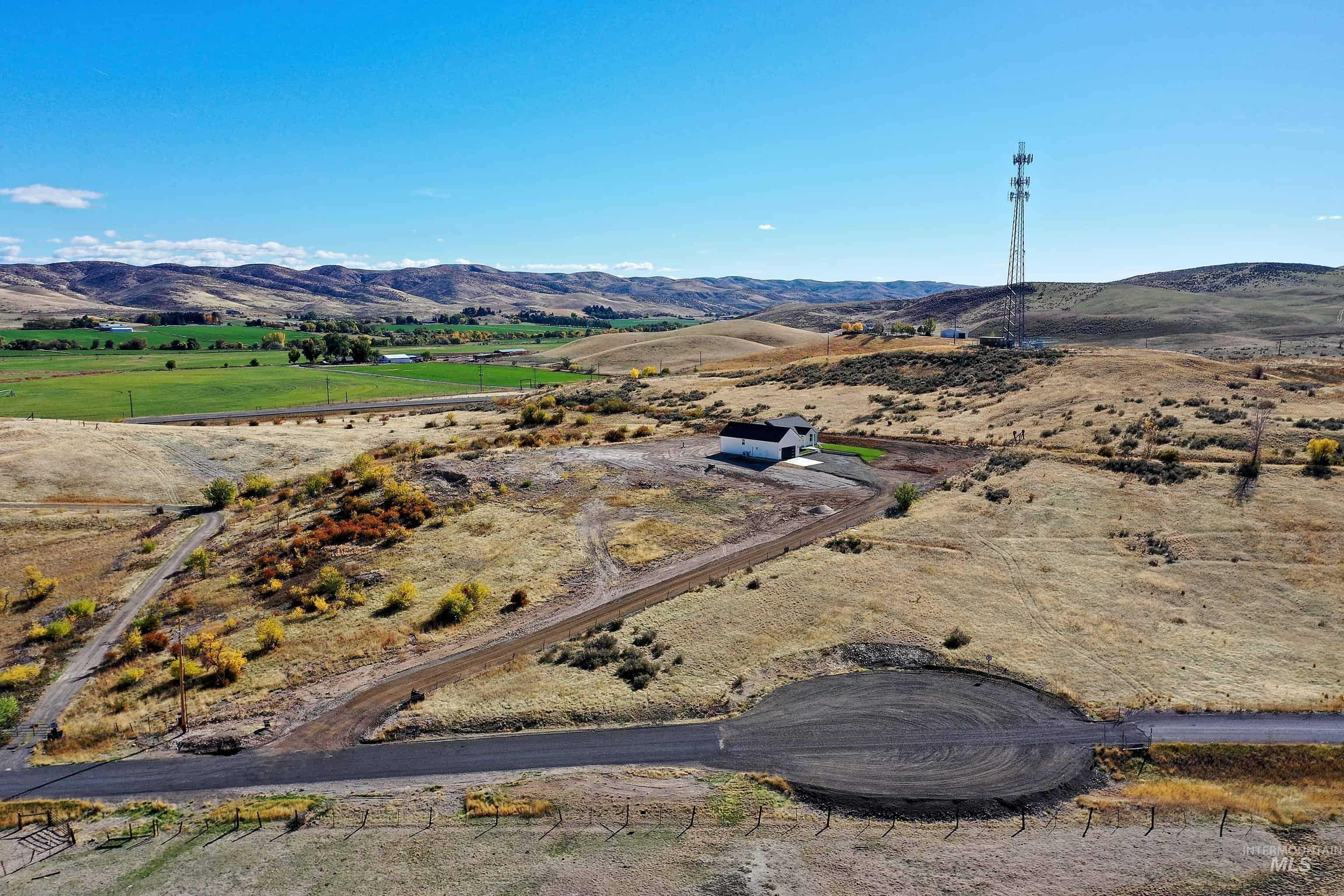 Overview of rural landscape with a mountainous background
