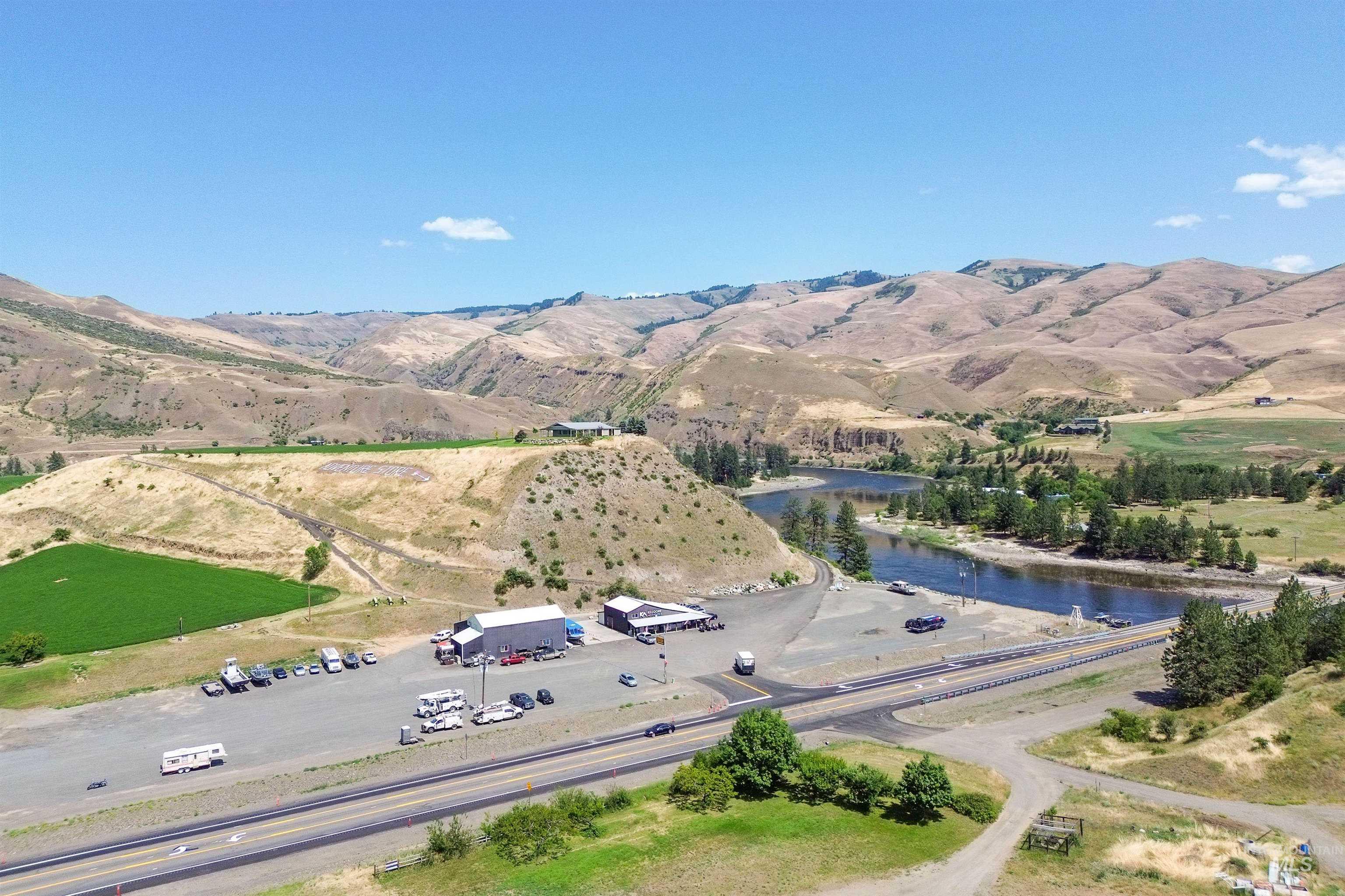 View of property location featuring a water and mountain view