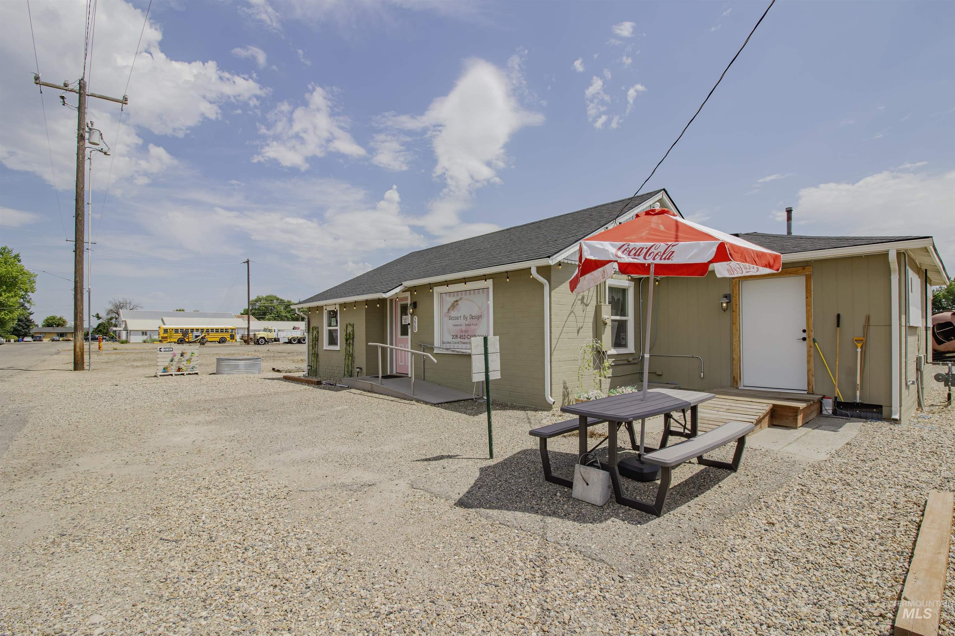 Rear view of house featuring a patio area