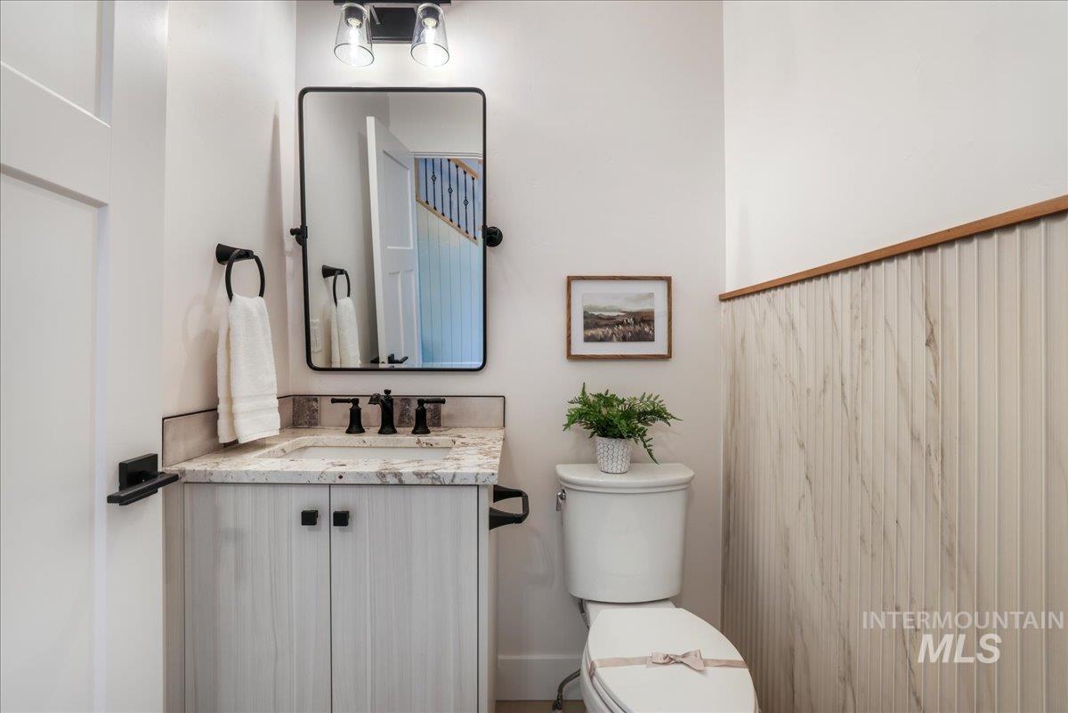 Bathroom featuring toilet and vanity
