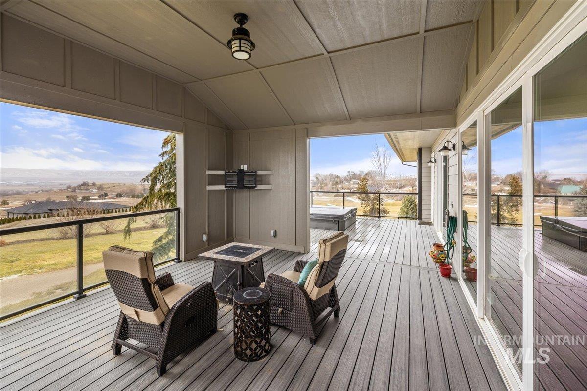 Deck featuring an outdoor fire pit