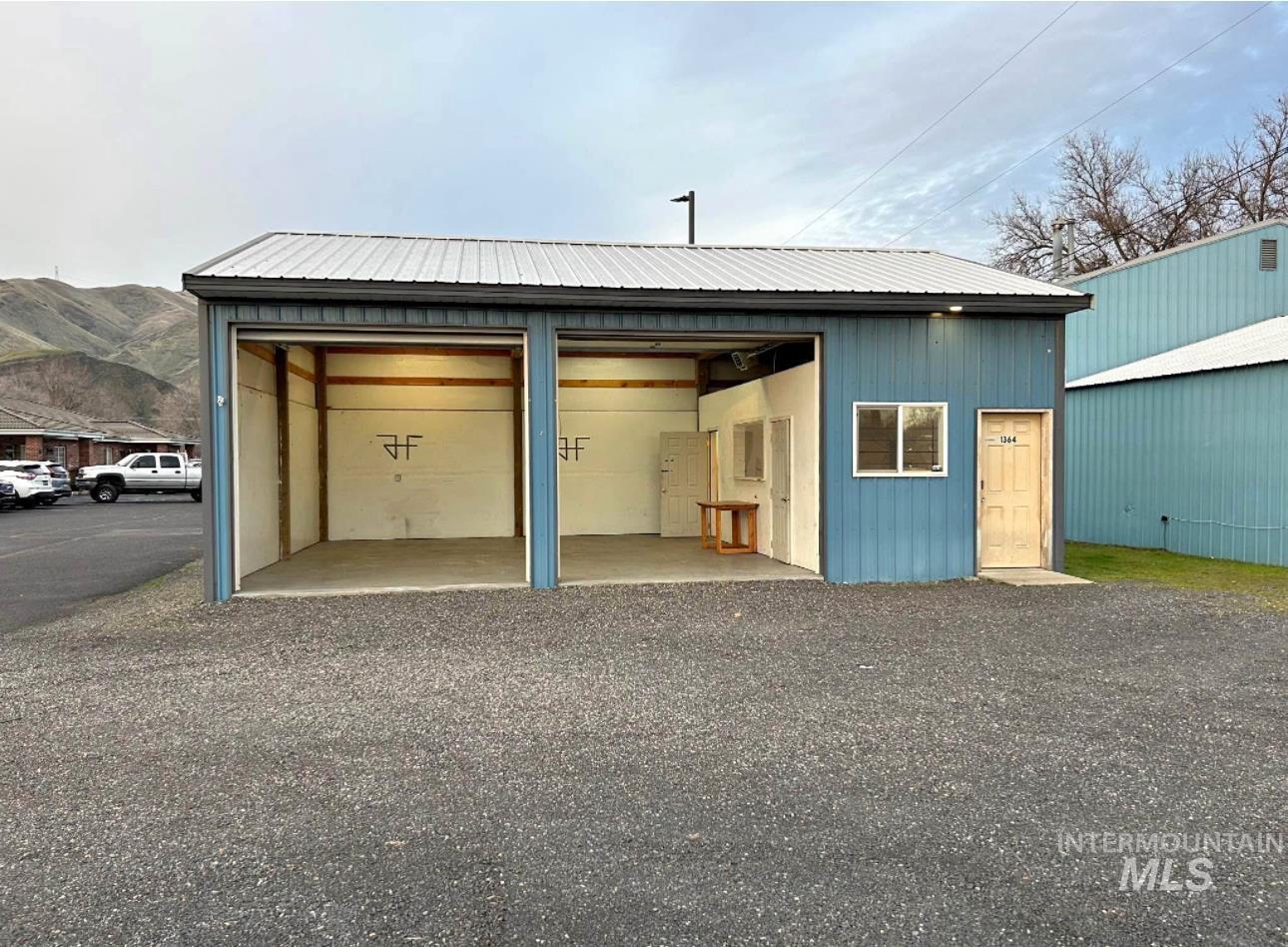 Detached garage with a mountain view