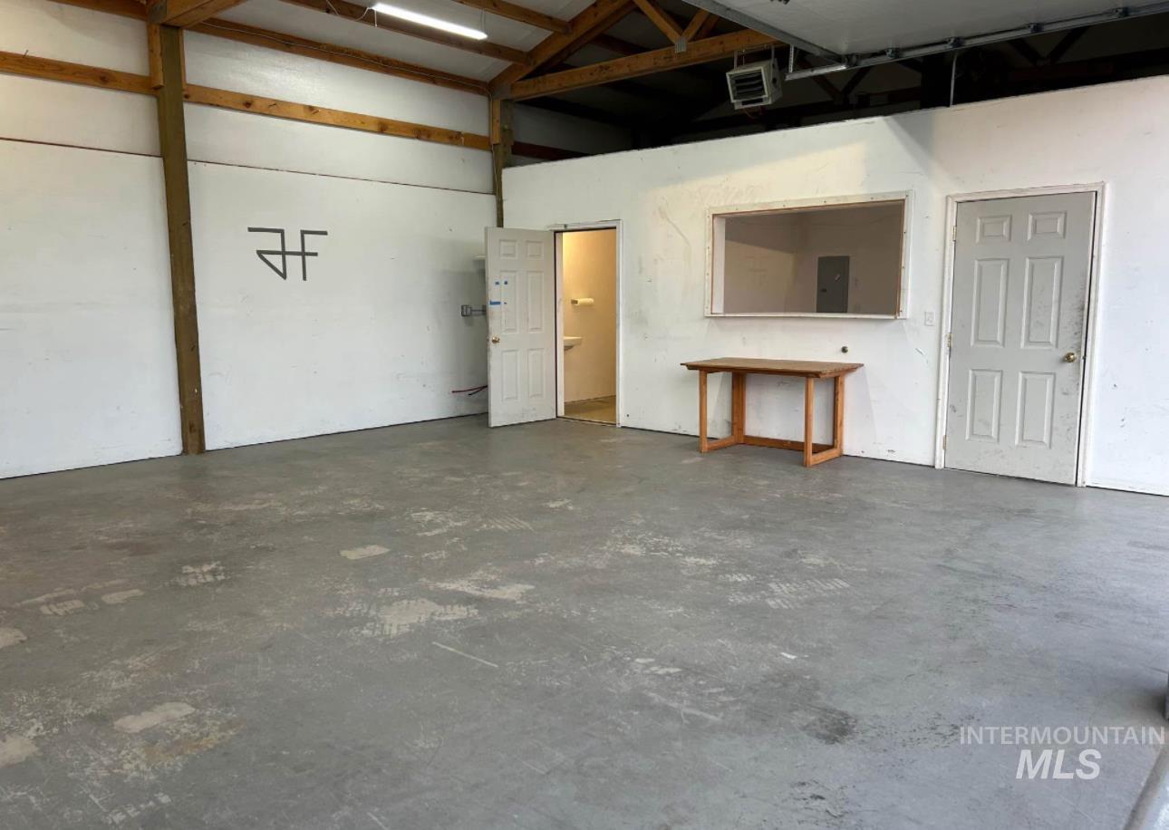 Garage featuring electric panel