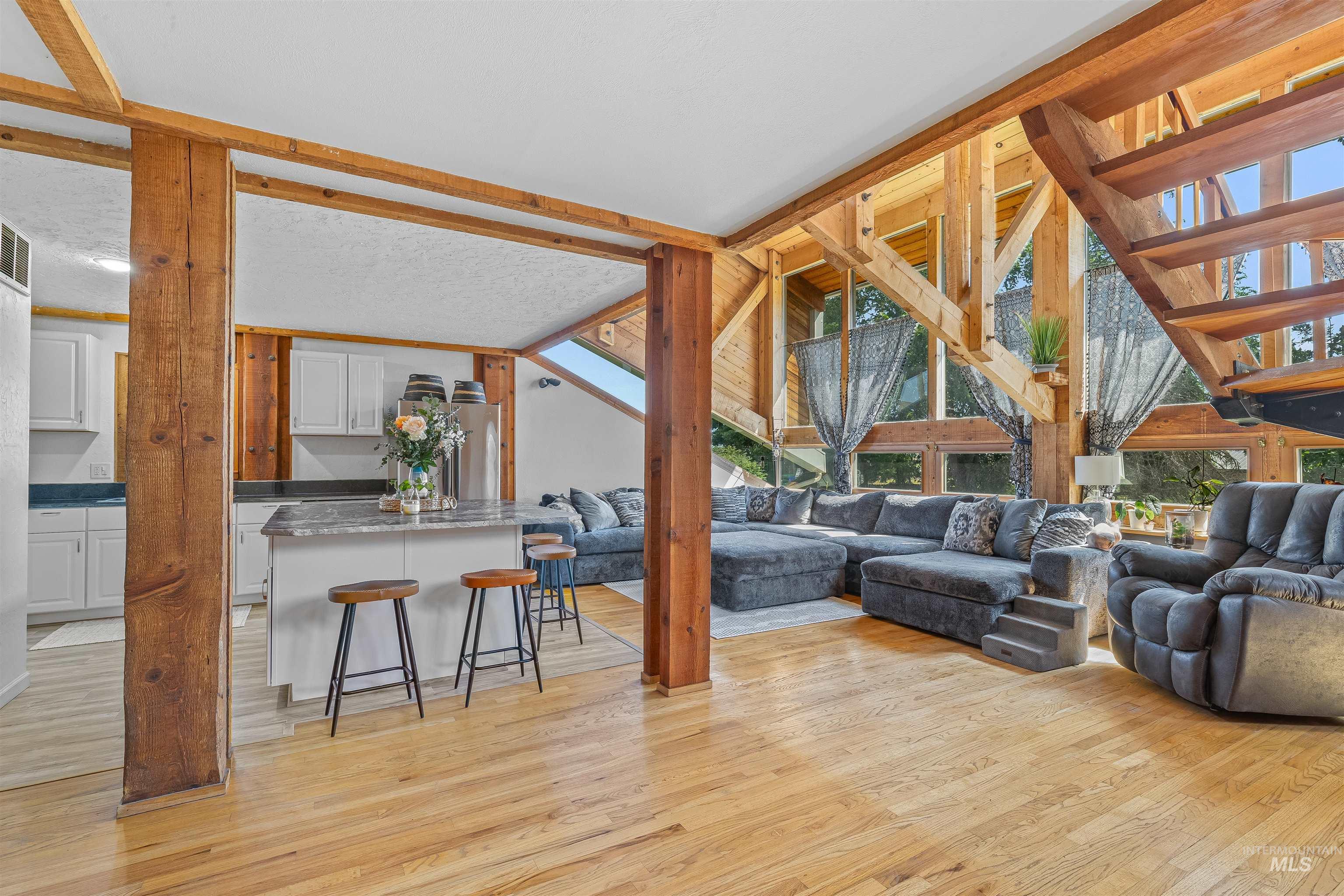 Living room featuring light wood-style flooring