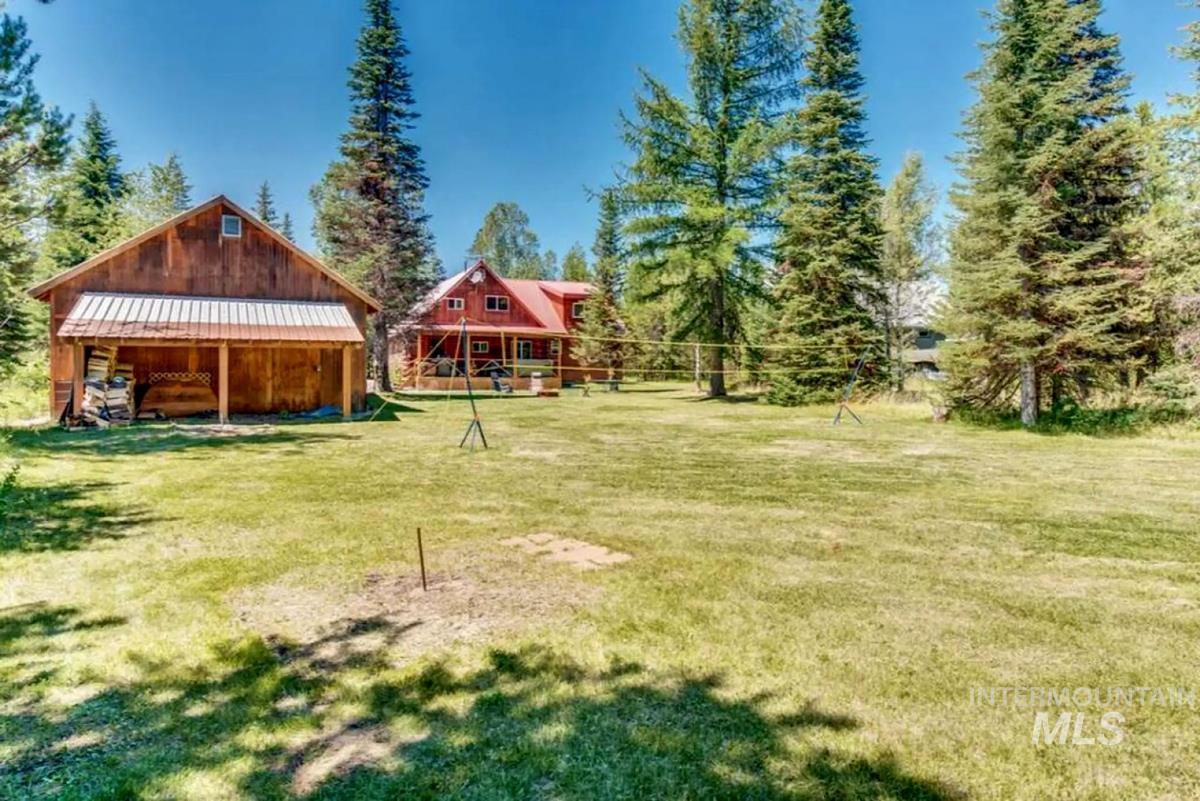 View of green lawn with an outdoor structure