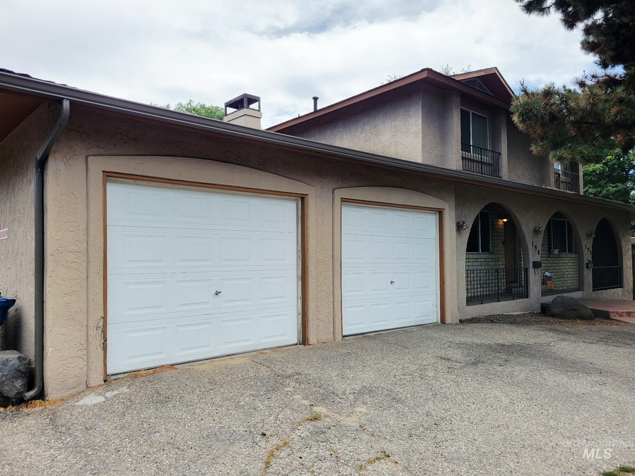 Garage featuring driveway