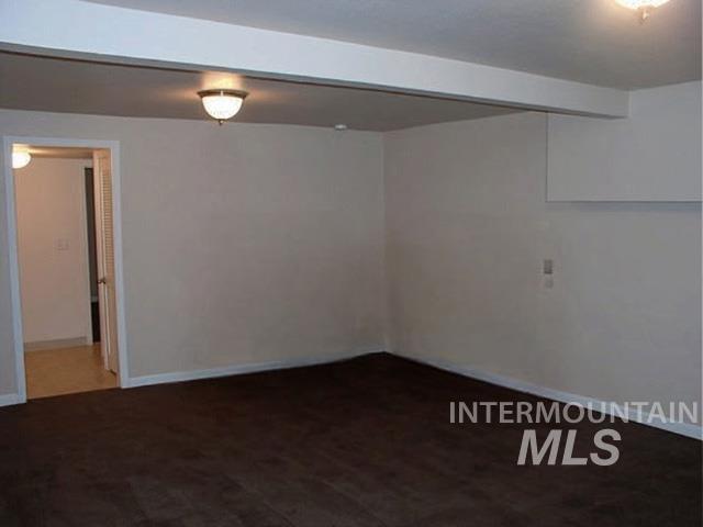 Finished basement with baseboards