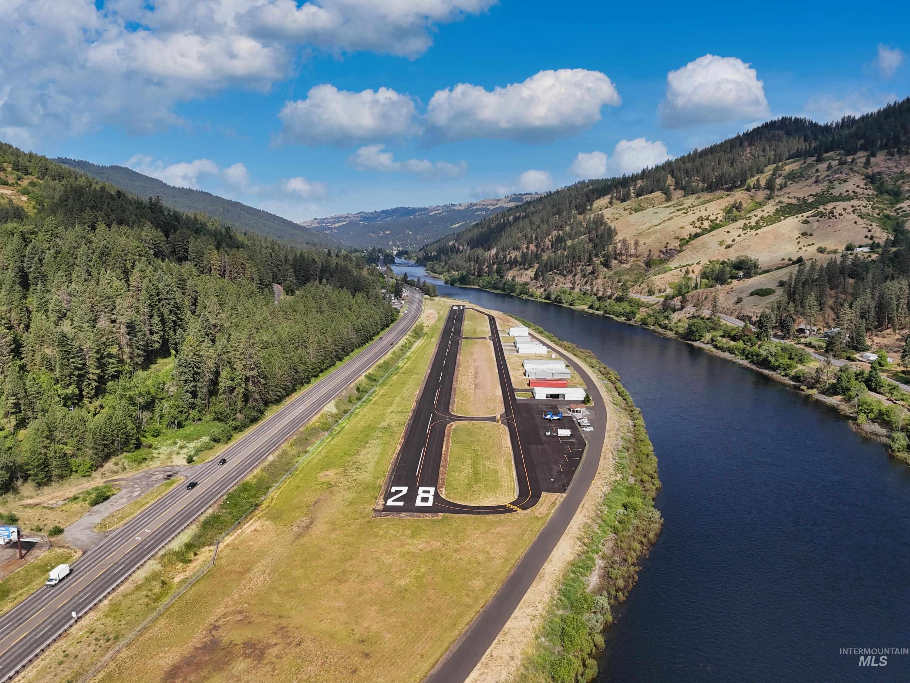 Drone / aerial view of Clearwater River and mountain view.