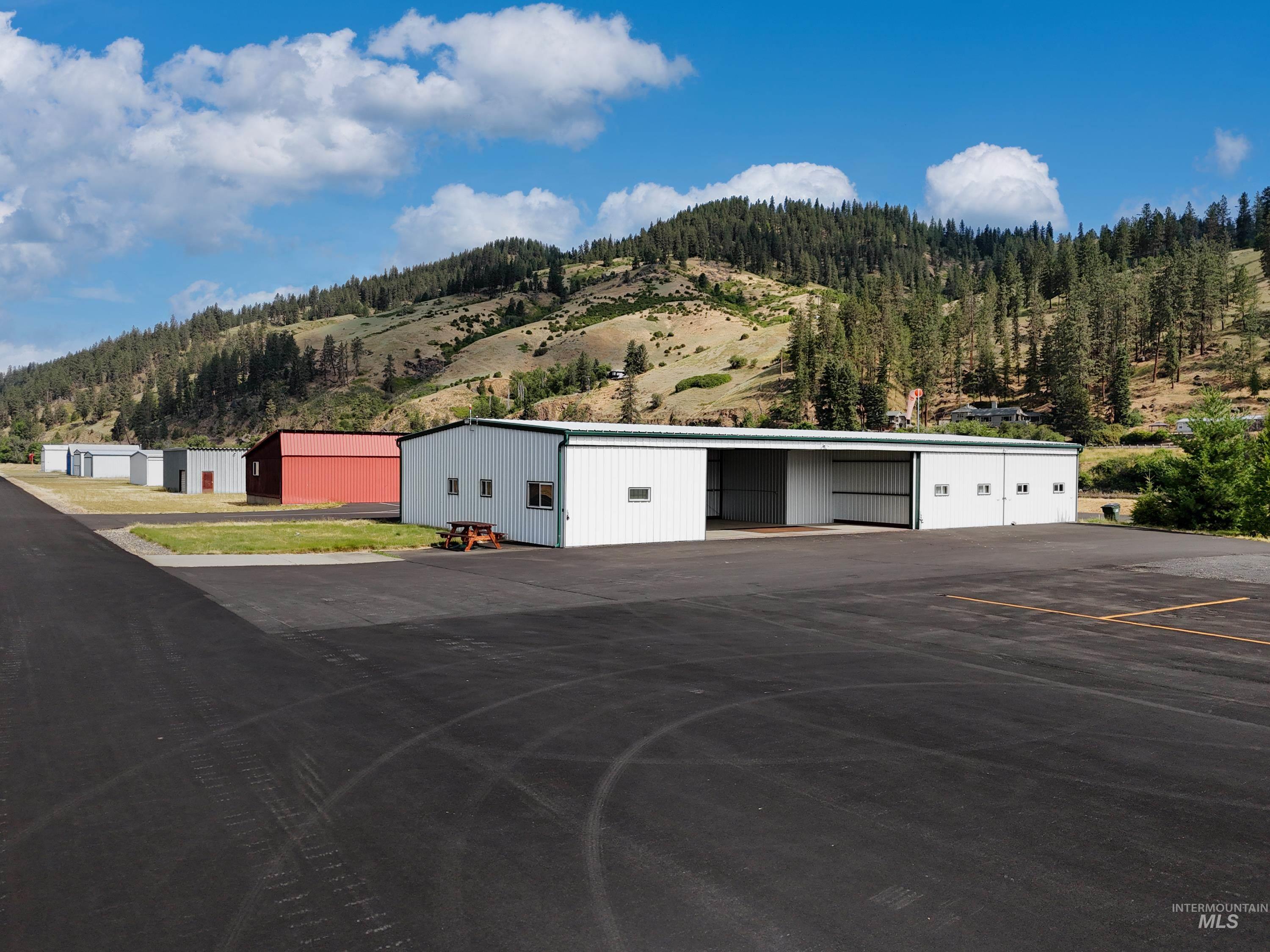 Hangar with a mountain view