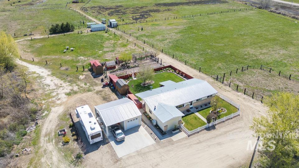 Aerial view of sparsely populated area with agricultural land