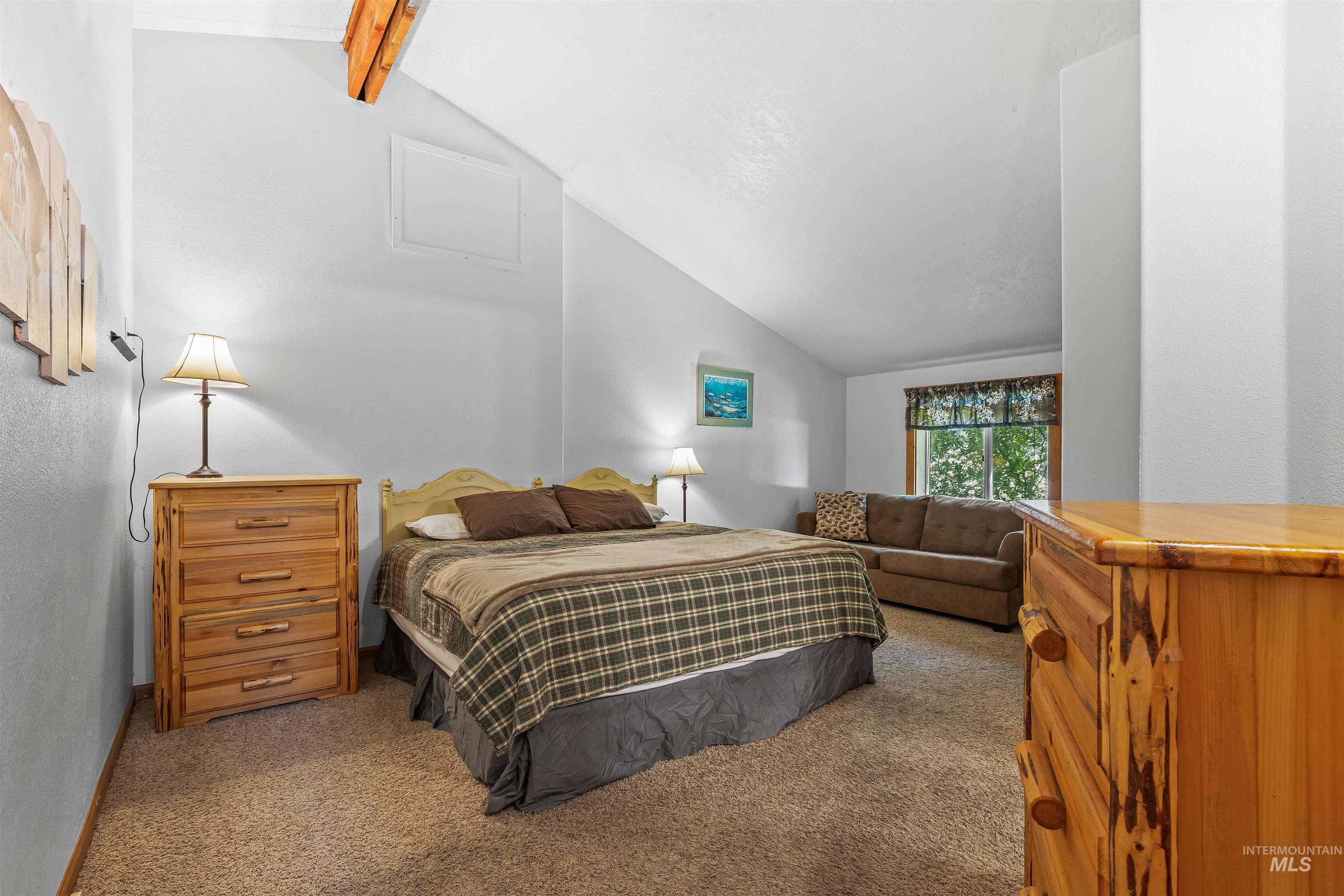 Bedroom featuring carpet