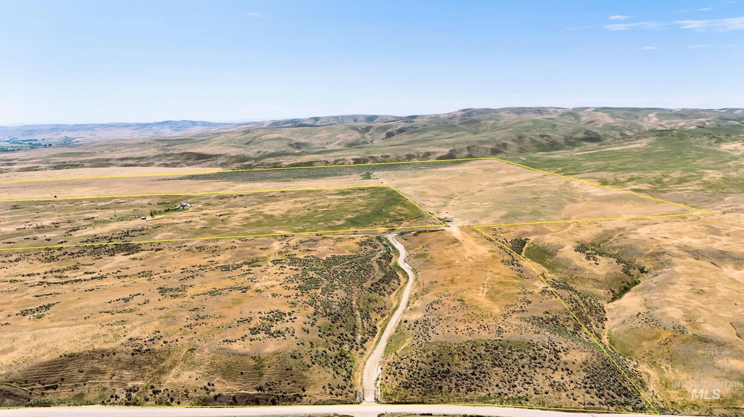 Aerial view of sparsely populated area featuring a mountain backdrop