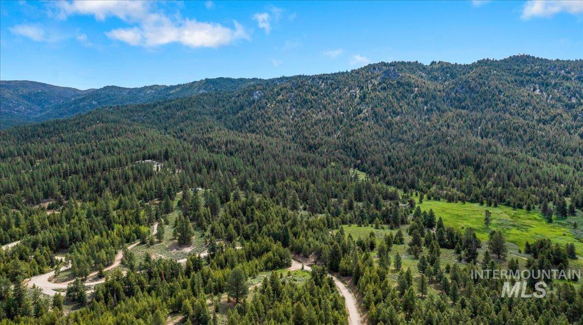 Drone / aerial view of a mountain backdrop