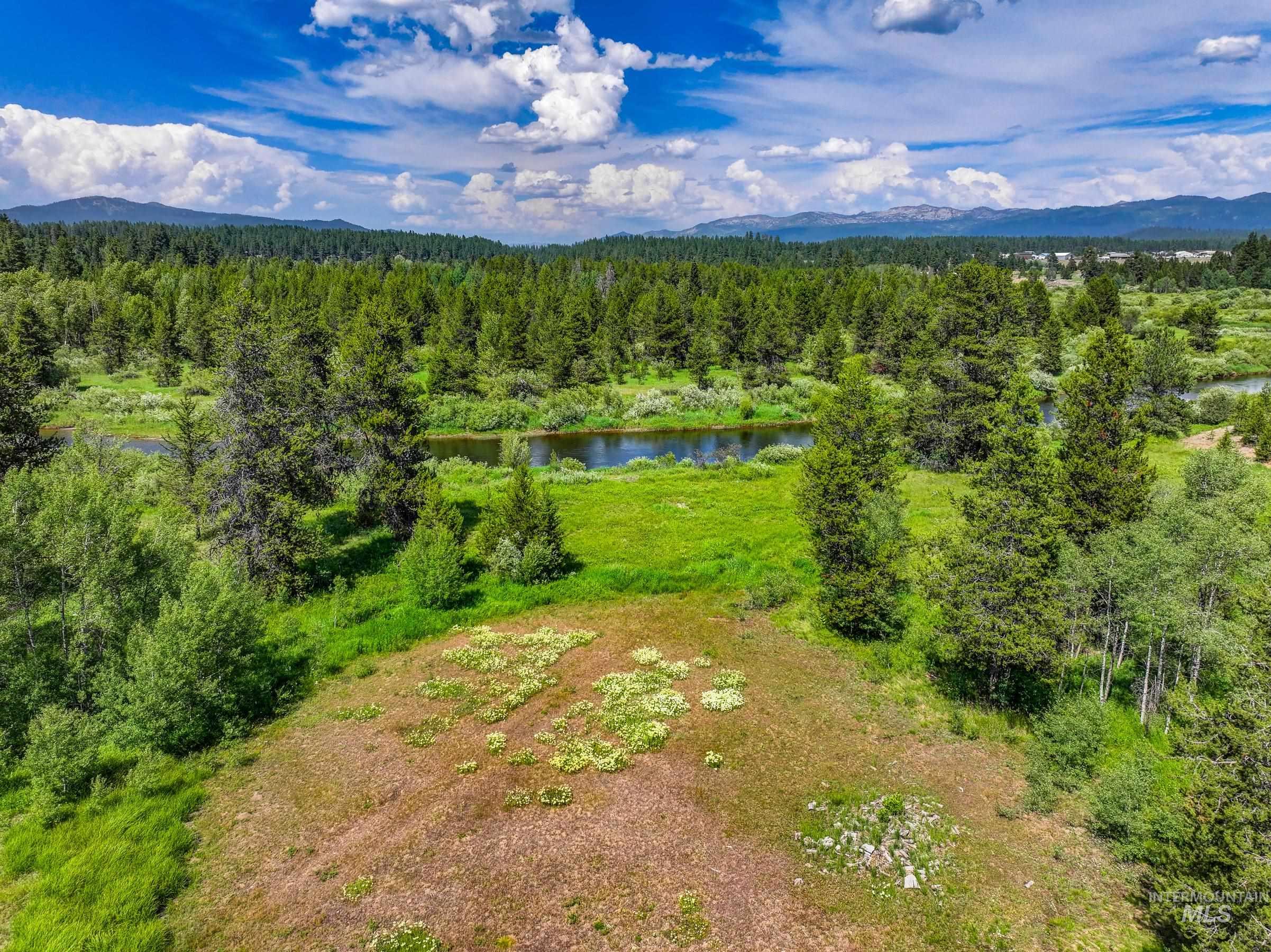 Drone / aerial view of a water and mountain view