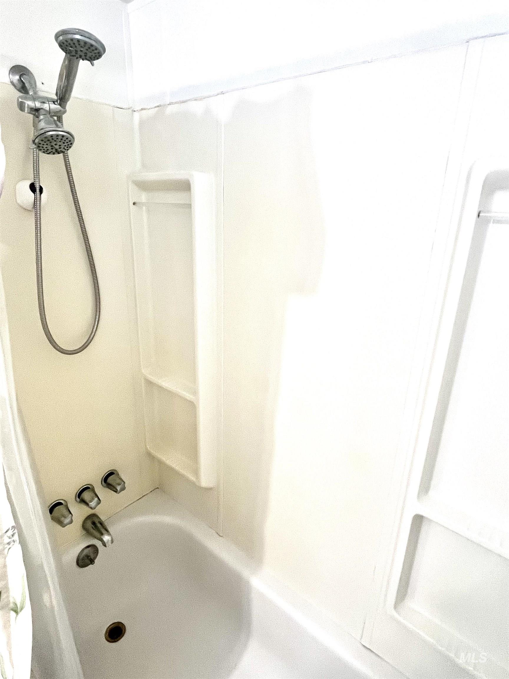 Bathroom with bathtub / shower combination