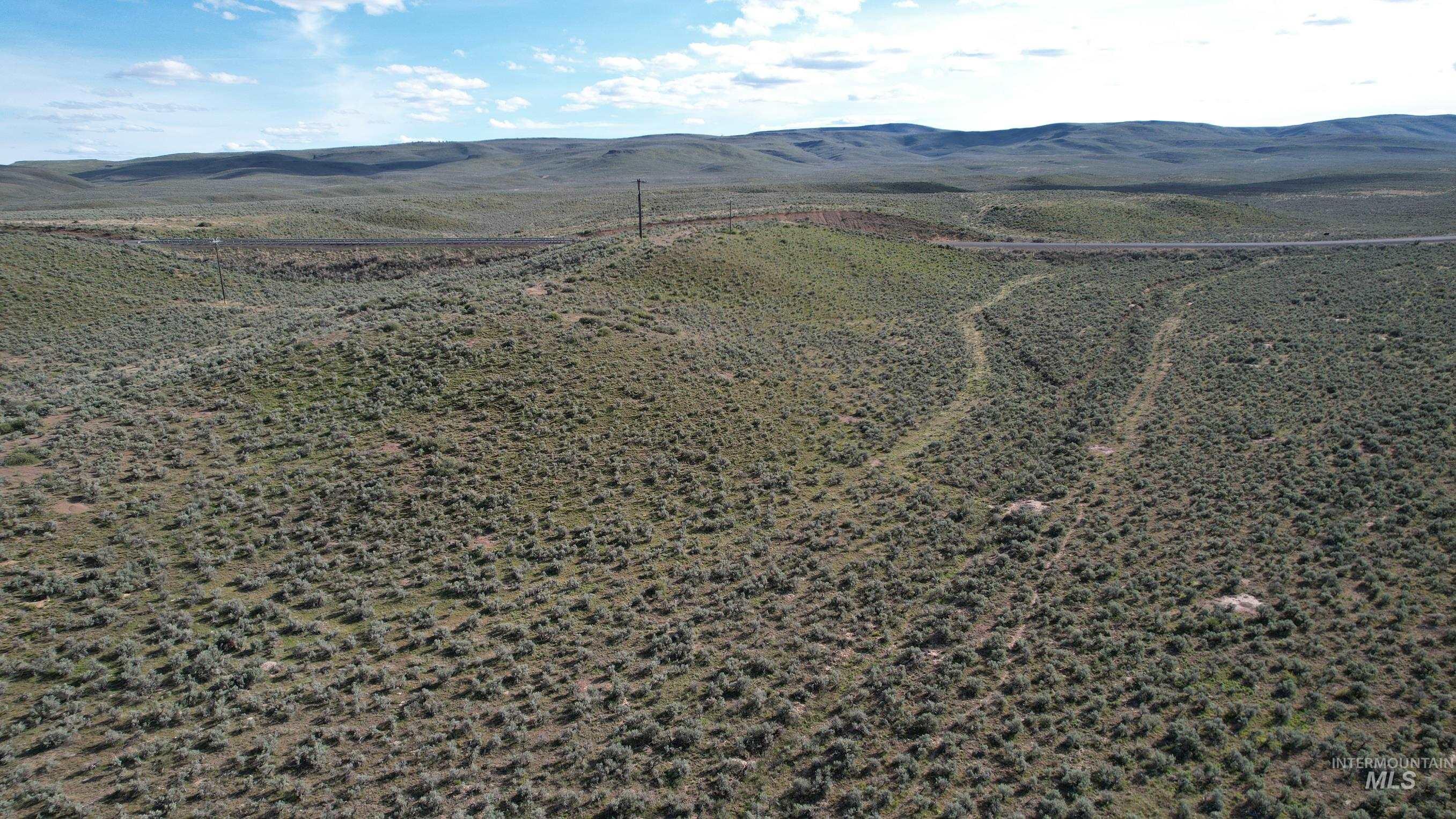 Drone / aerial view of a mountain backdrop