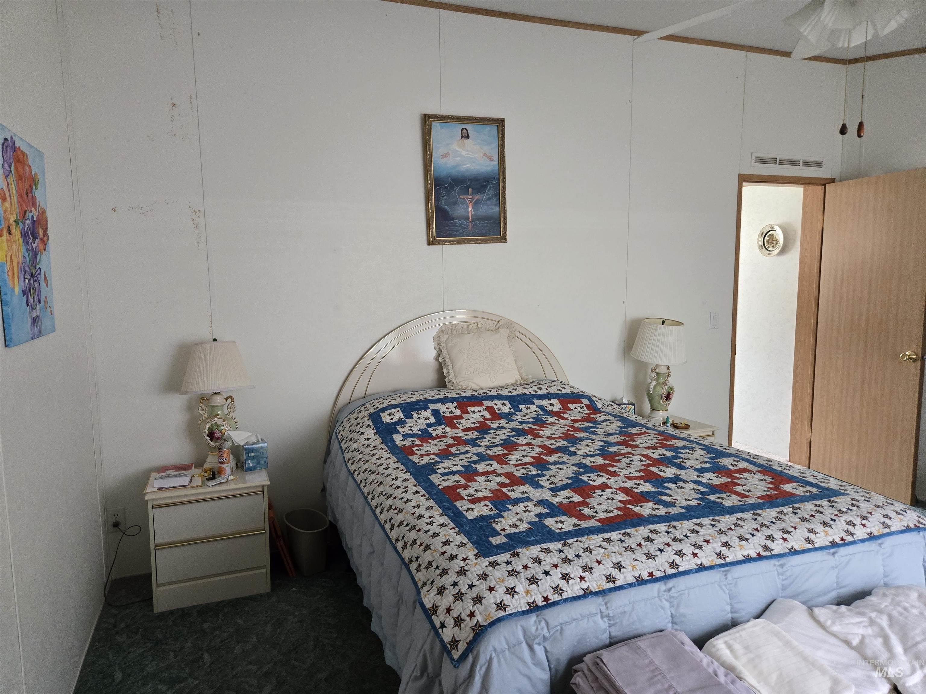 View of carpeted bedroom
