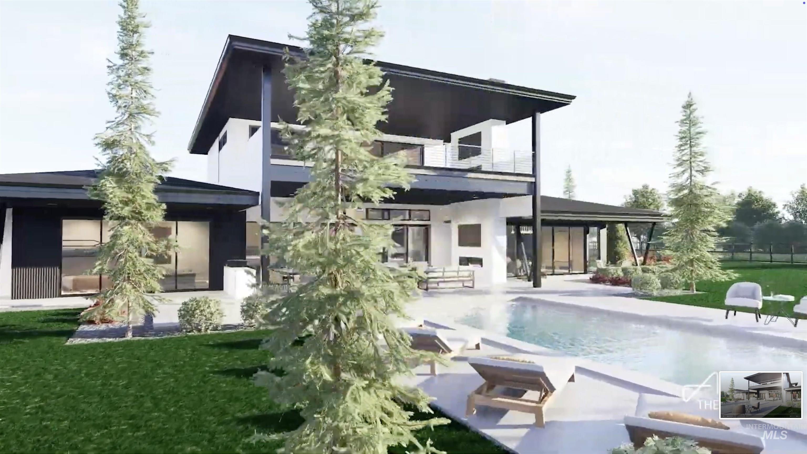 Rear view of house featuring a balcony, a patio, an outdoor pool, and a lawn