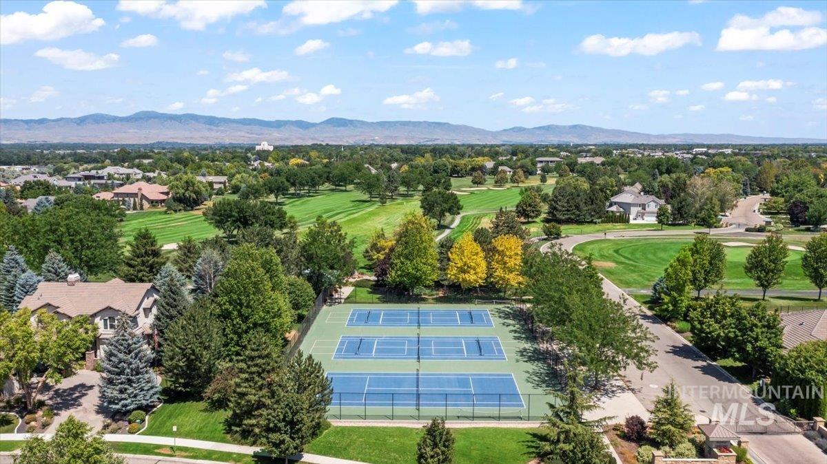 Bird's eye view of a mountain backdrop and a golf club