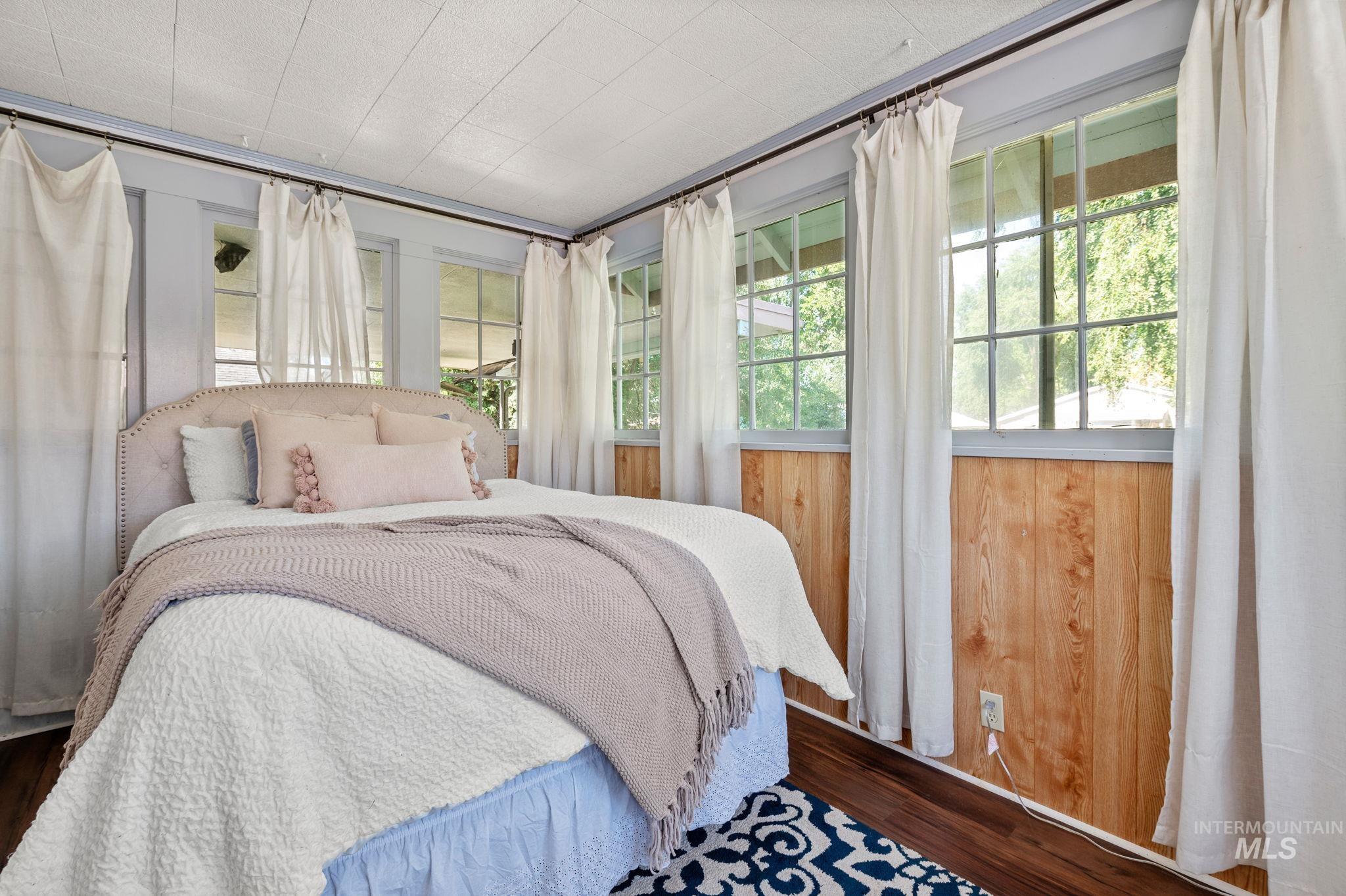 Bedroom featuring wood finished floors