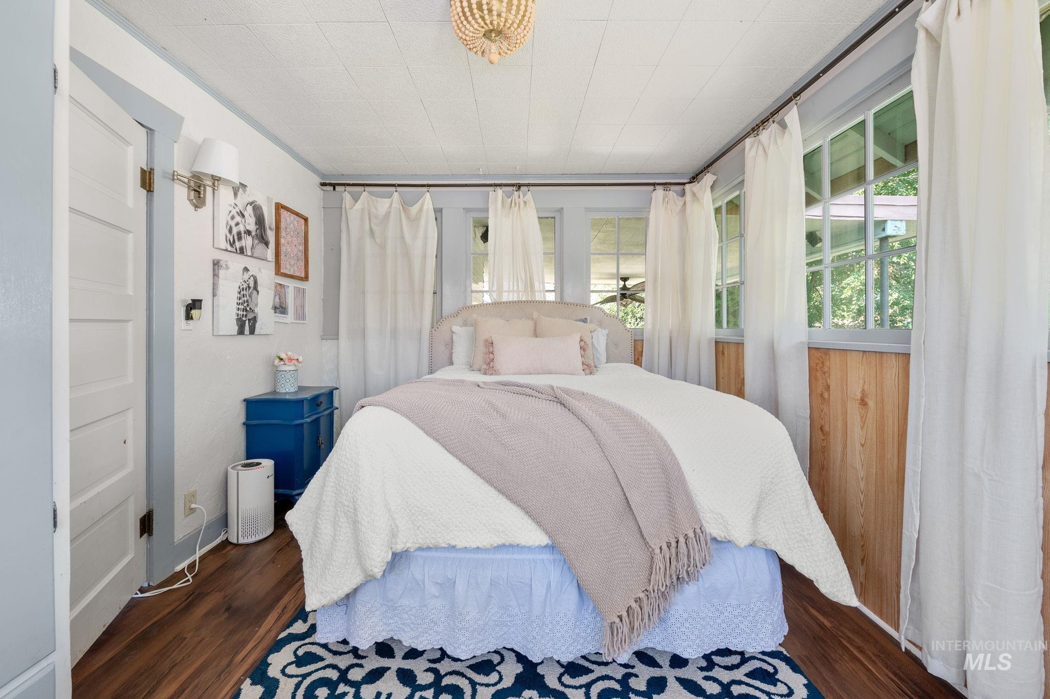 Bedroom featuring wood finished floors