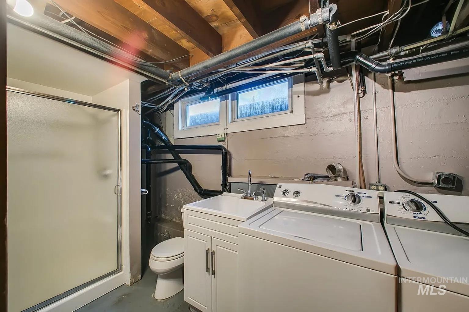 Washroom with separate washer and dryer