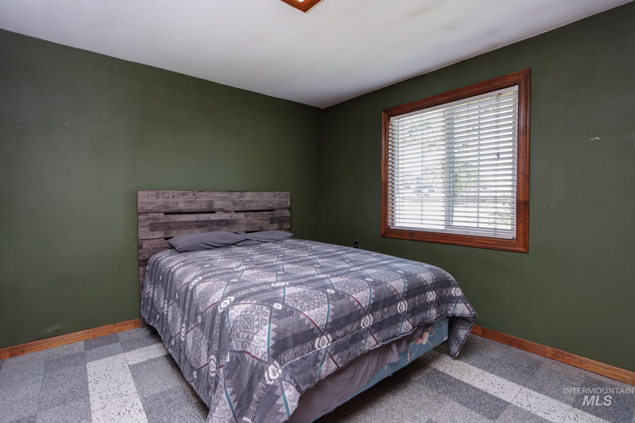 Bedroom with baseboards