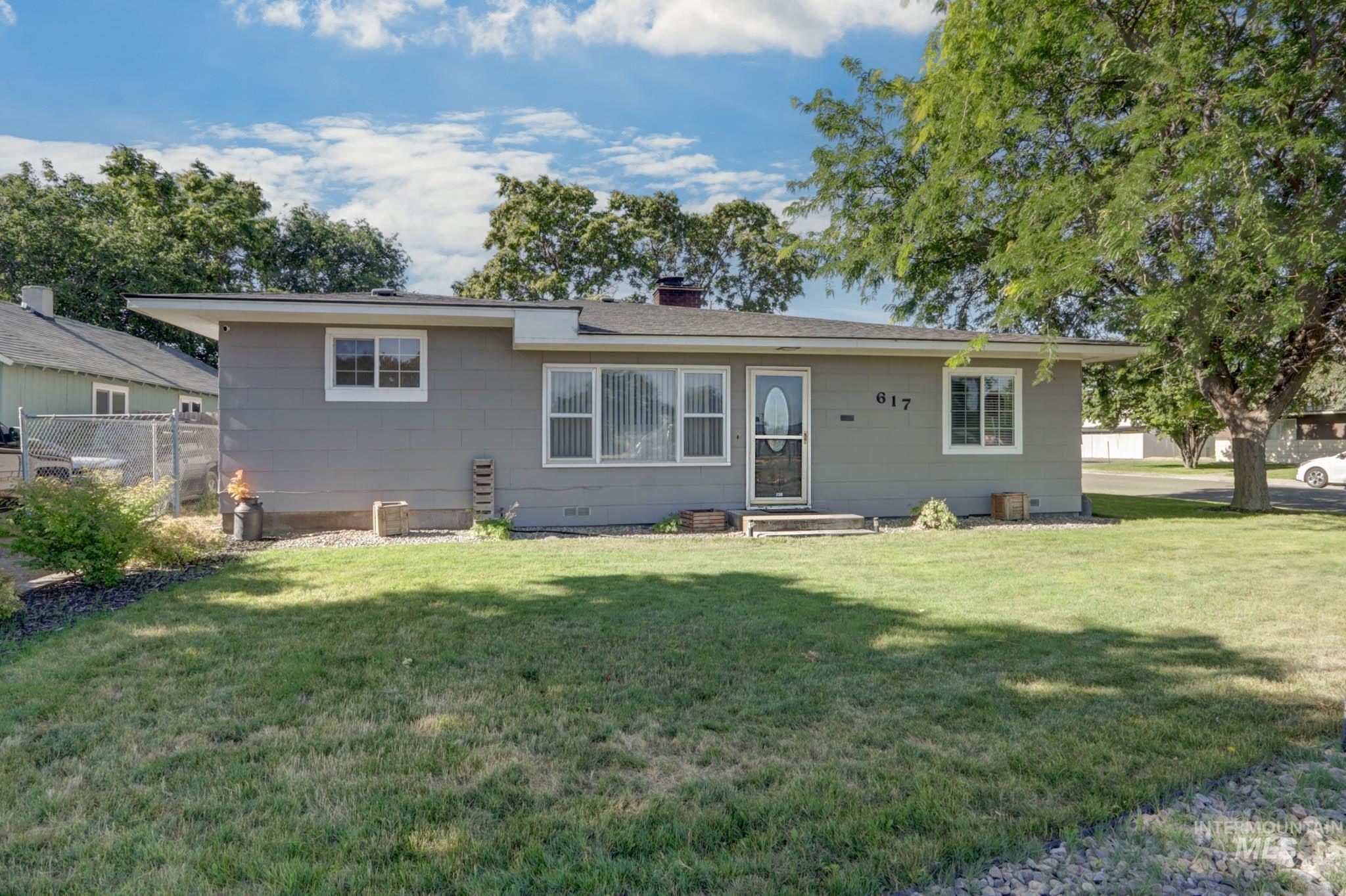 View of front of house with a chimney