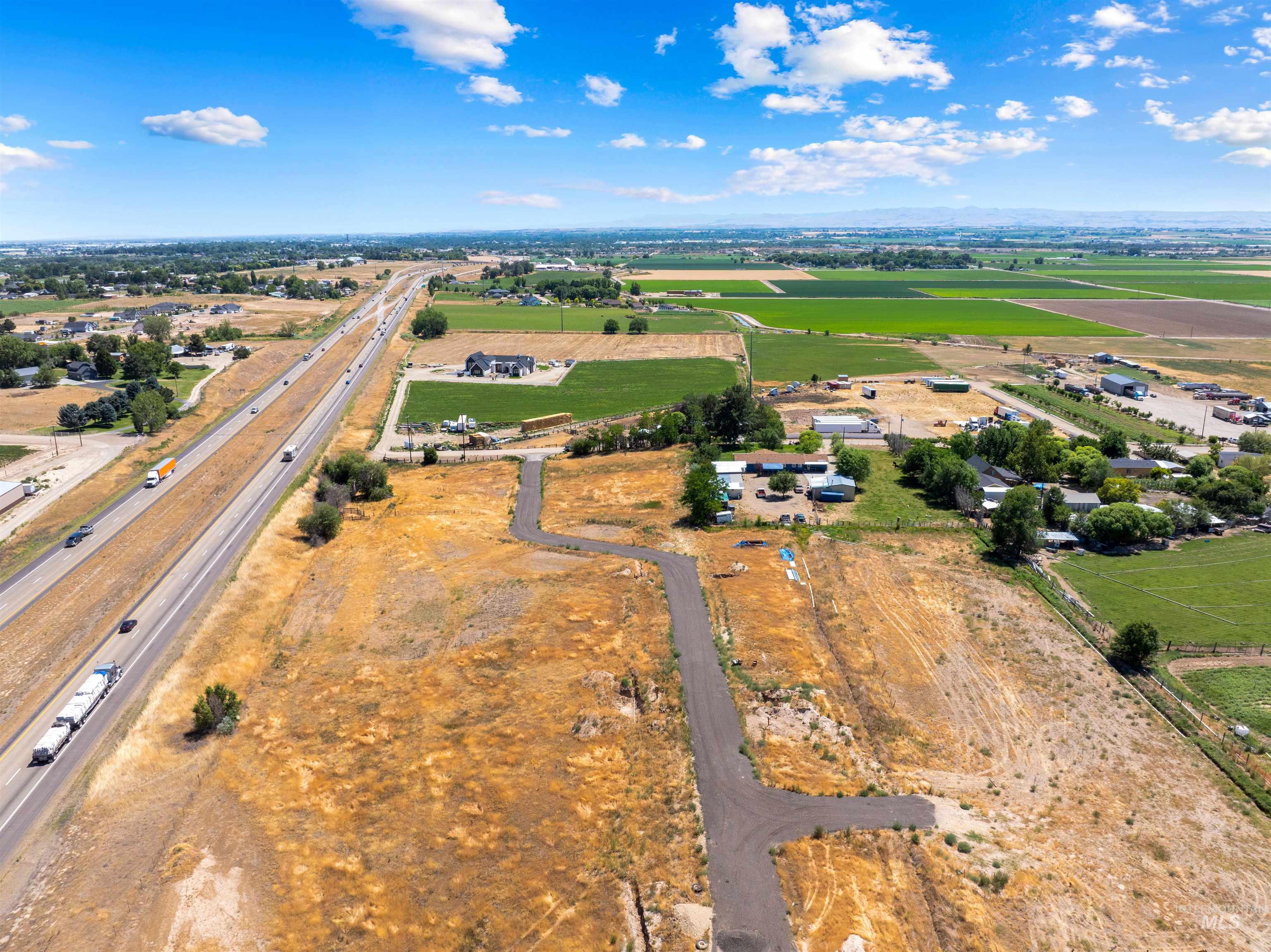 Aerial overview of property's location featuring rural landscape
