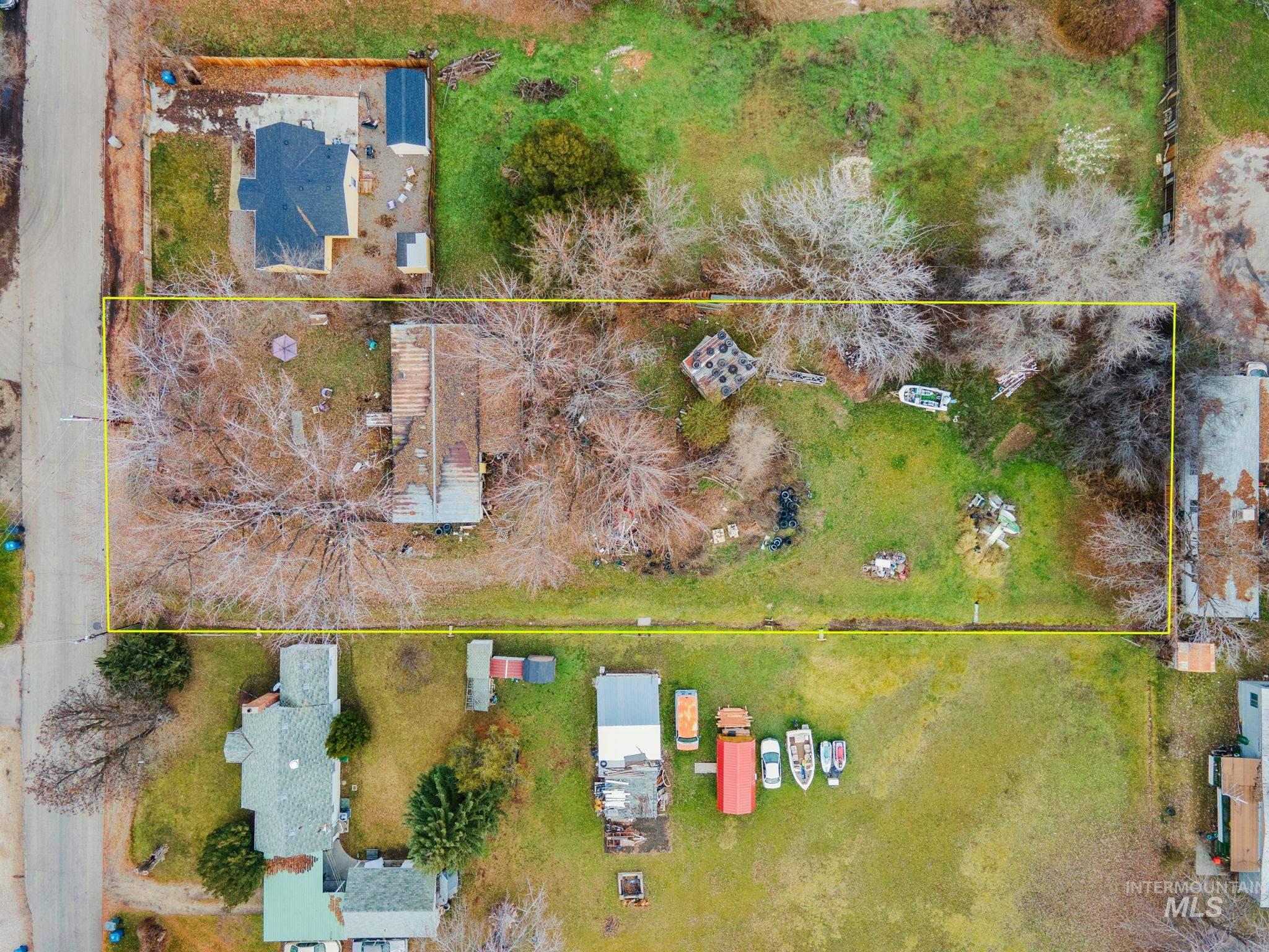 Aerial overview of property's location with property parcel outlined