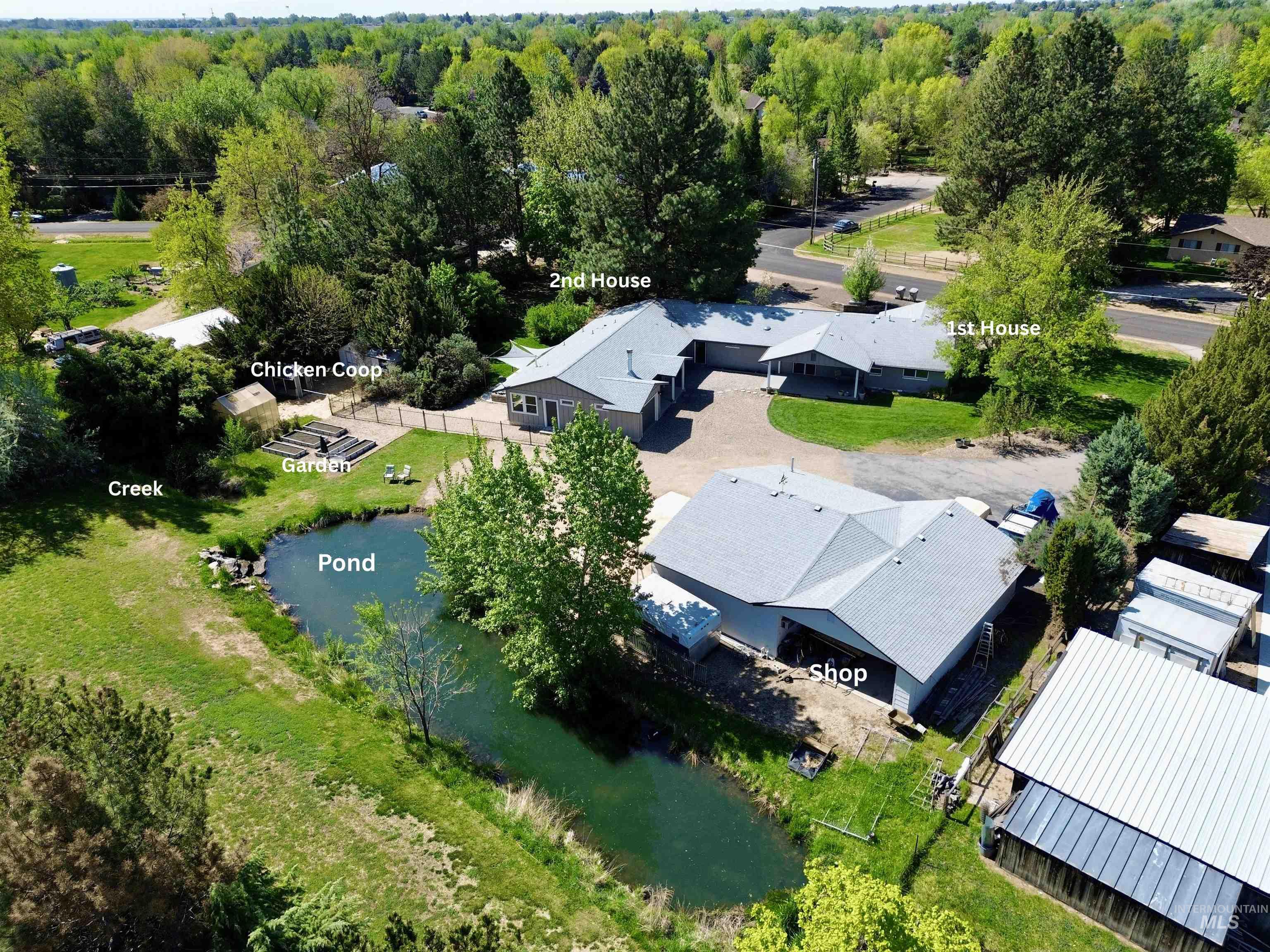 Bird's eye view of a large body of water and a heavily wooded area