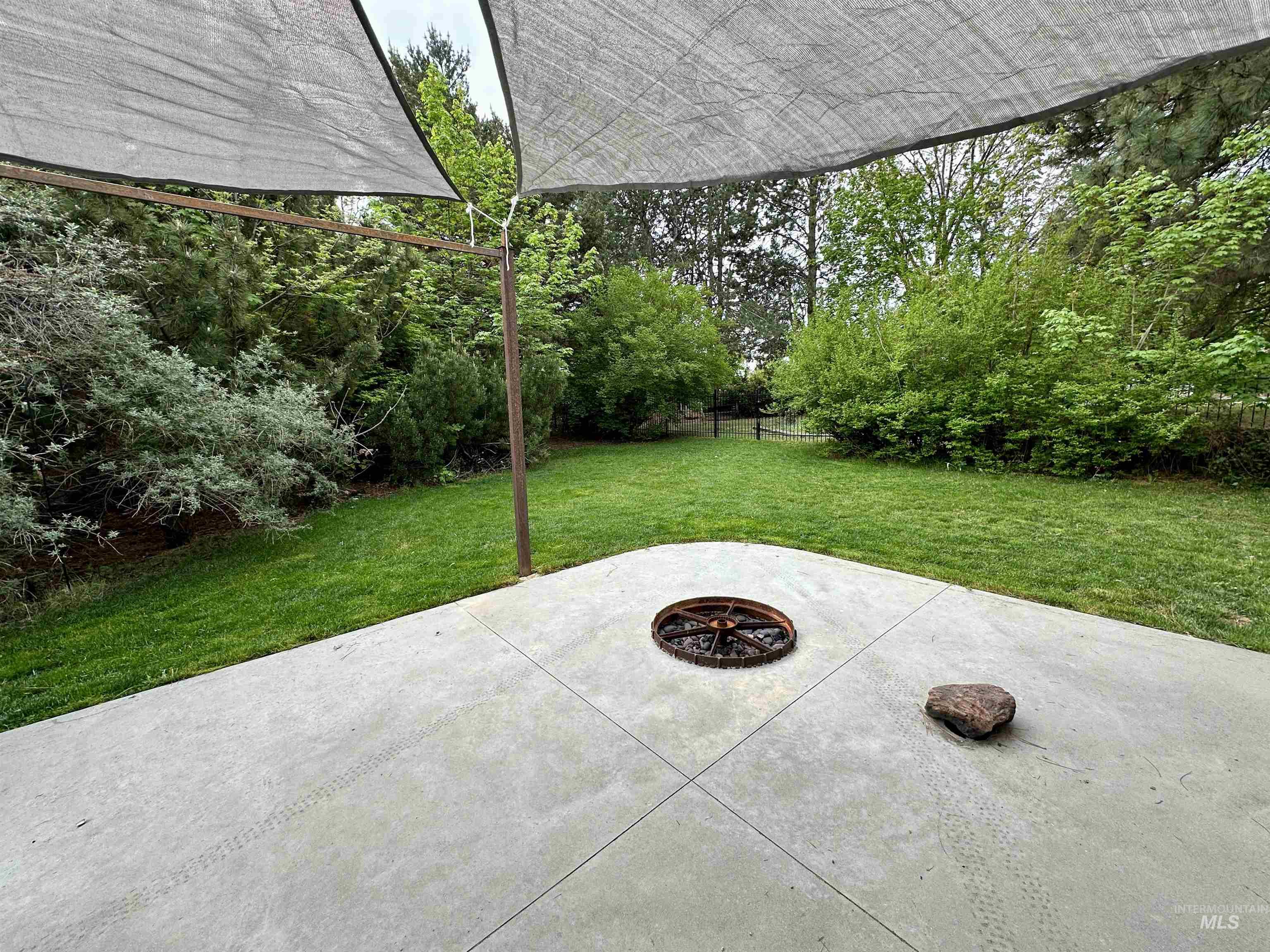 View of patio / terrace featuring a fire pit