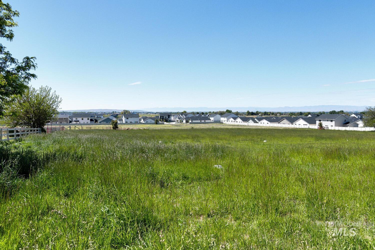 Water view featuring nearby suburban area