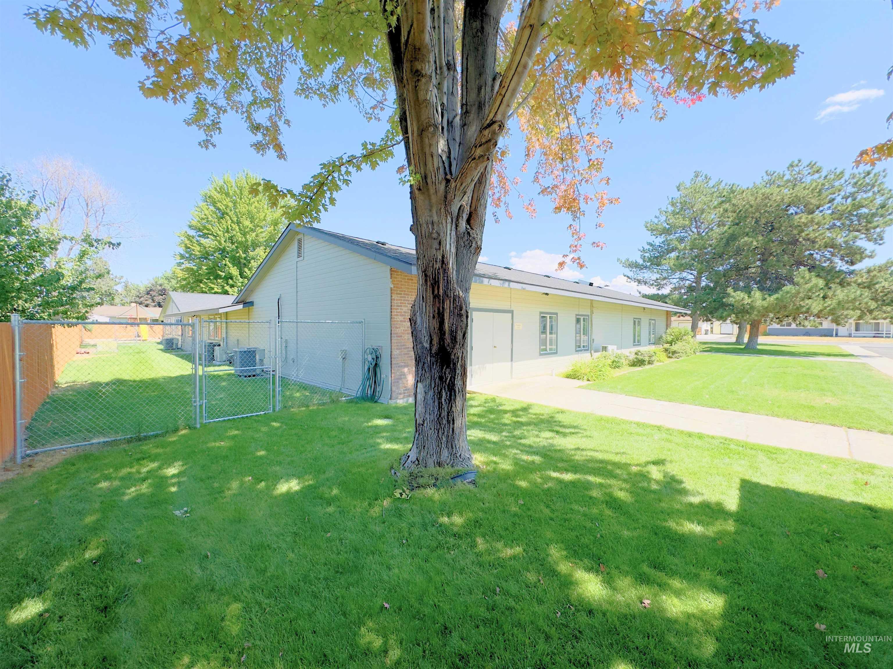 View of yard featuring a gate