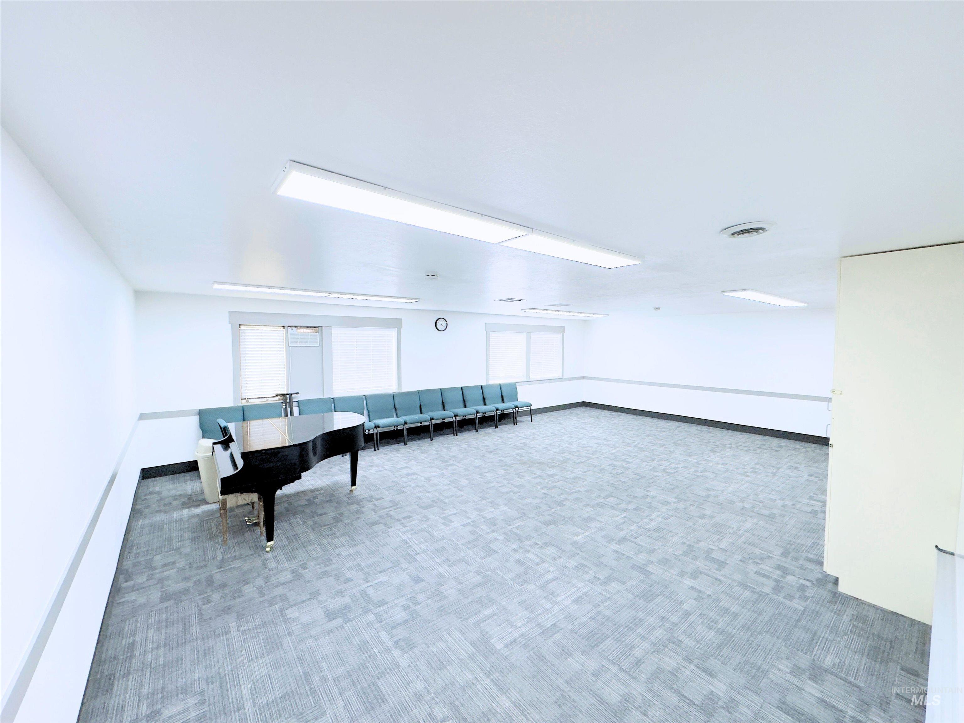 Recreation room featuring carpet flooring
