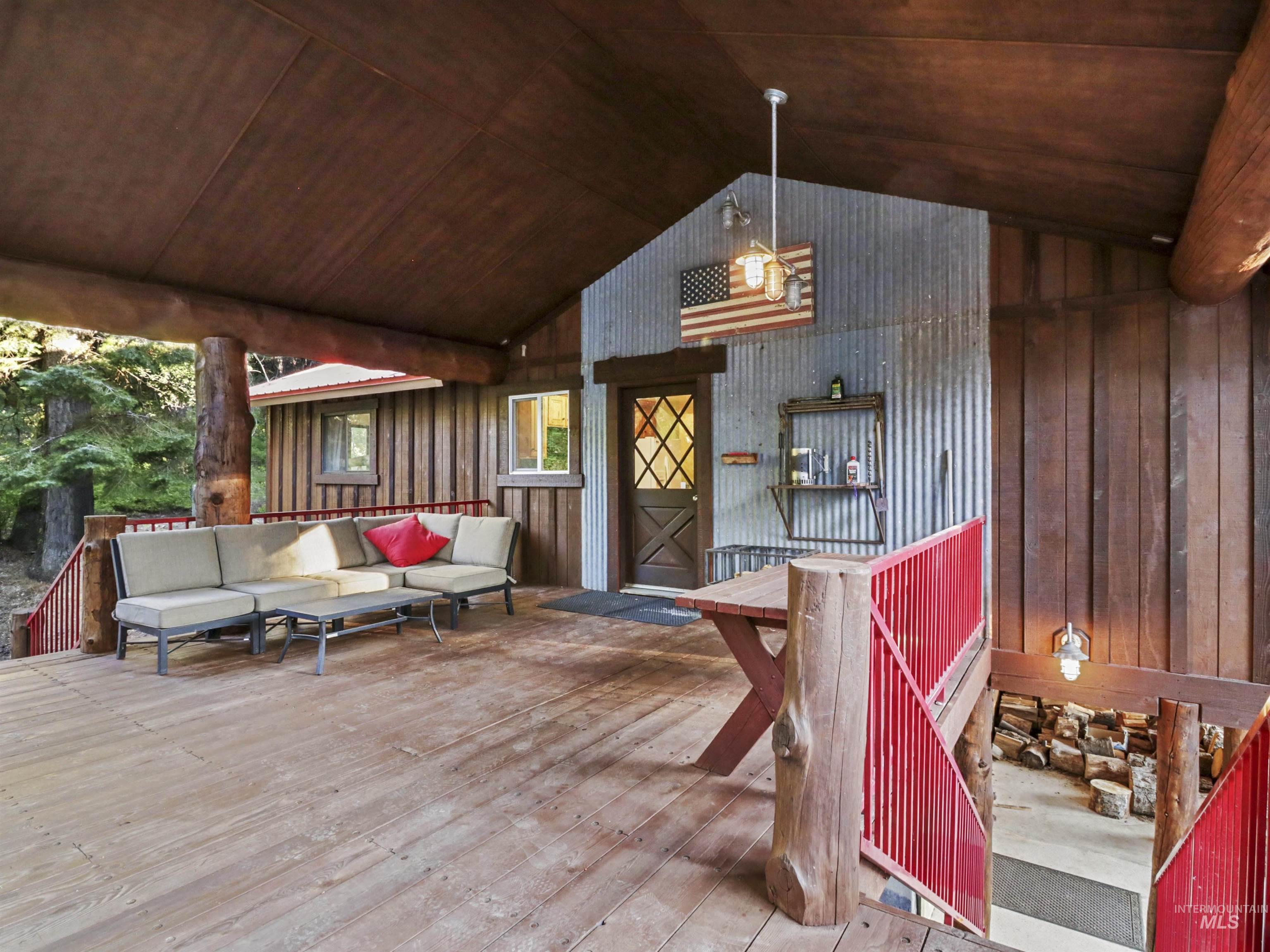 Wooden terrace with an outdoor hangout area