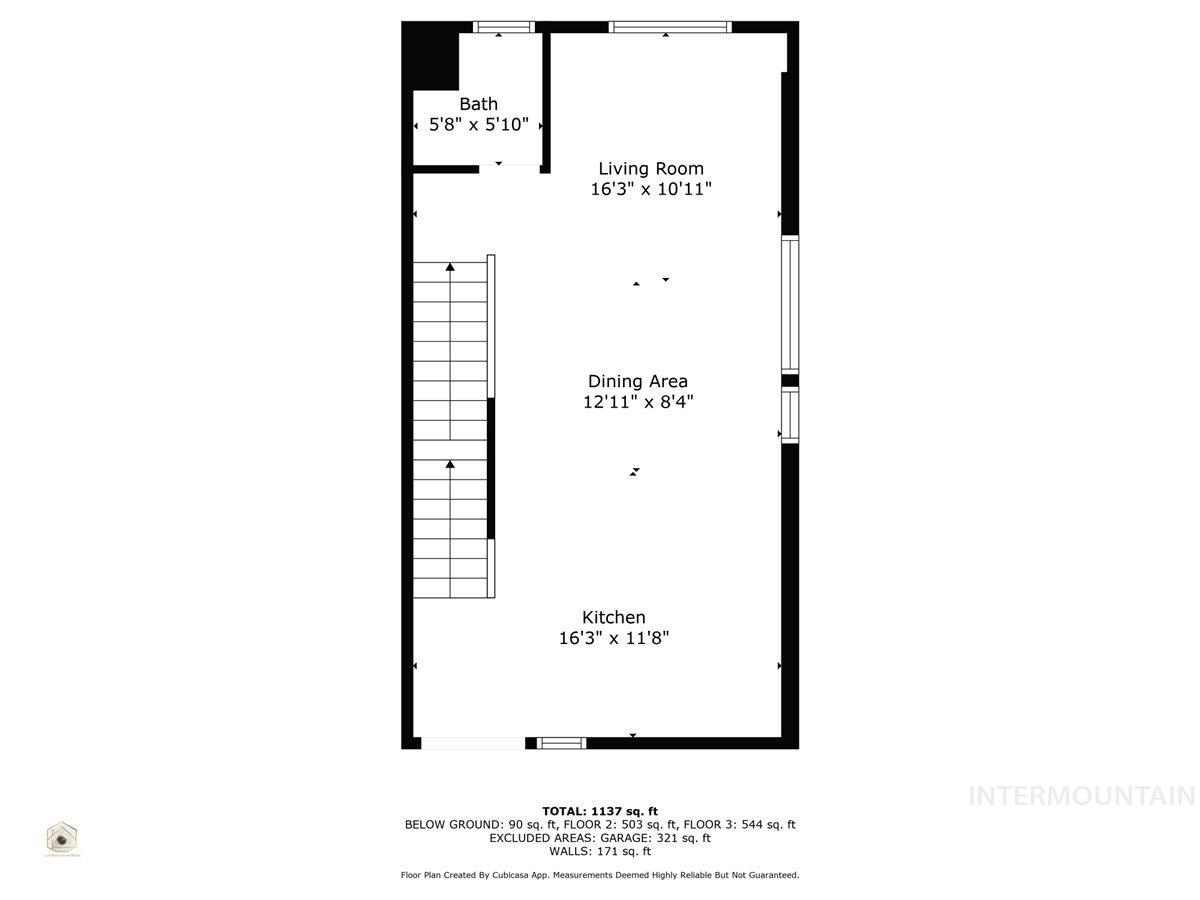 Showing open concept w/living room, dining area, and kitchen, along with a half-bath.