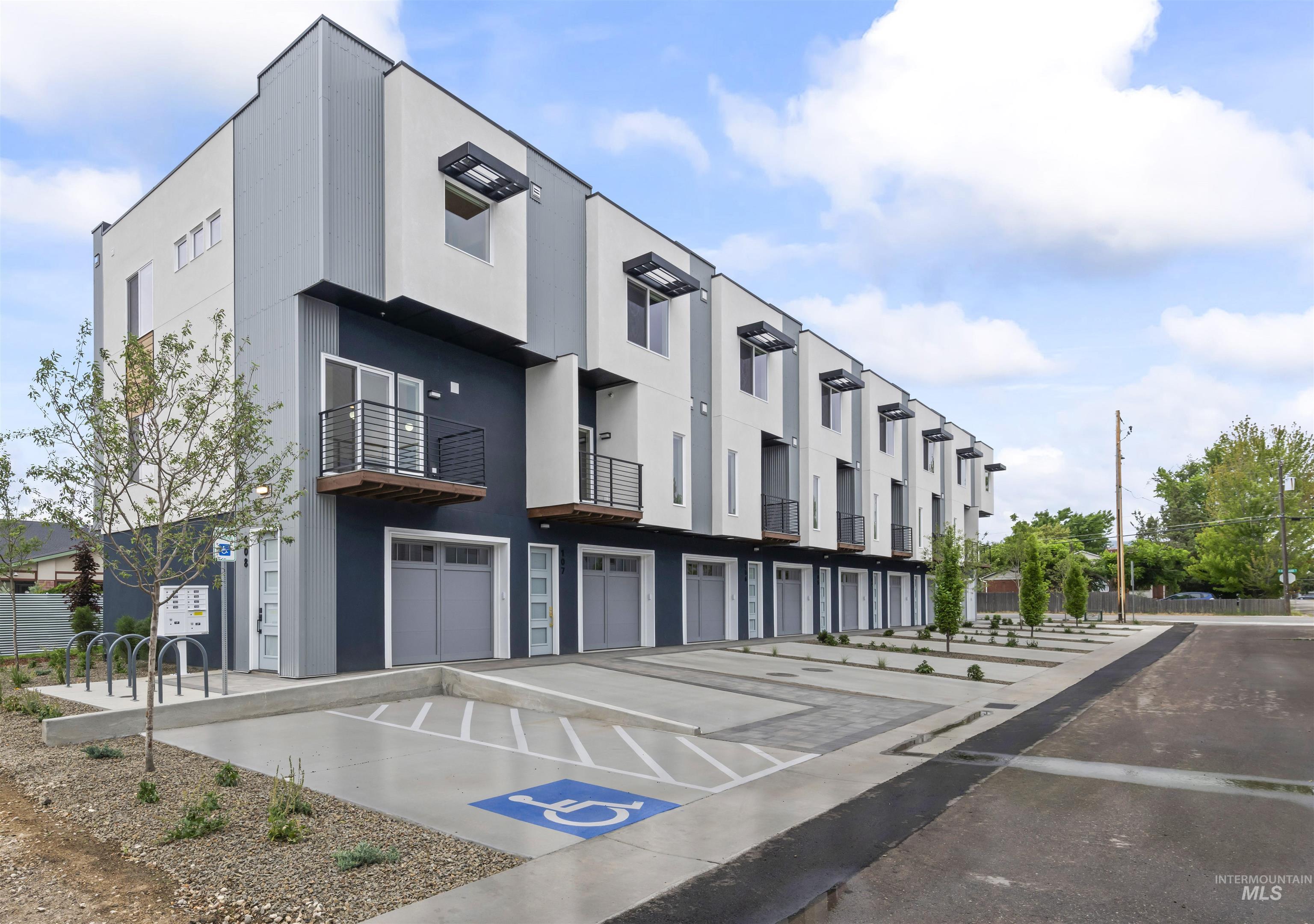 View of exteriof of unit 108 (end unit) and the side view of the property.