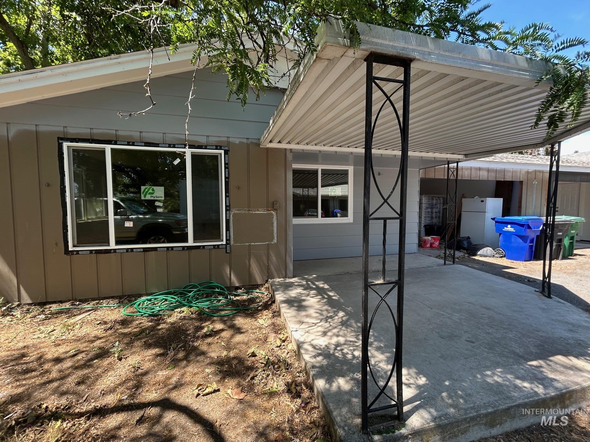 View of front facade with a patio