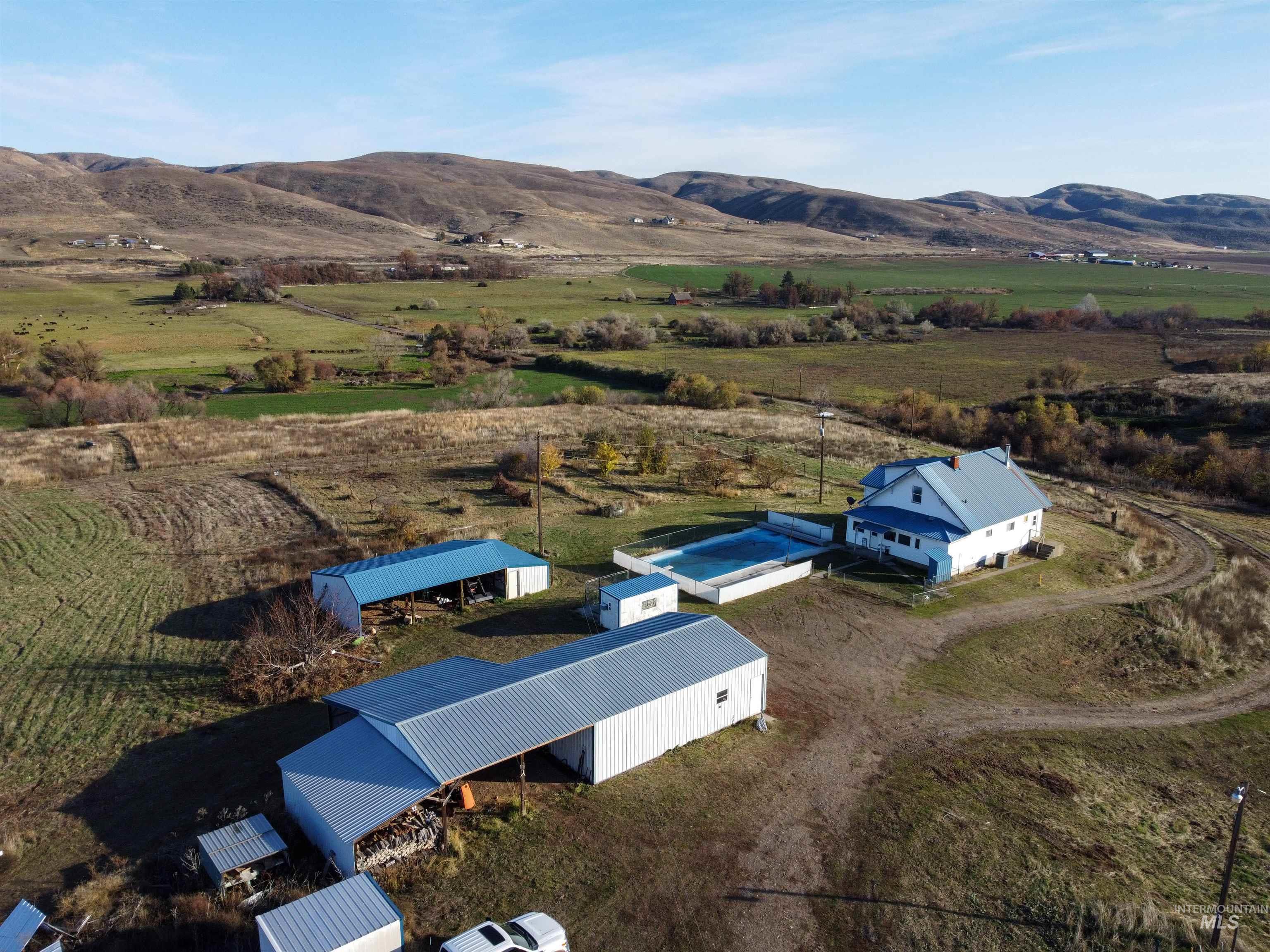 Overview of rural landscape with a mountainous background