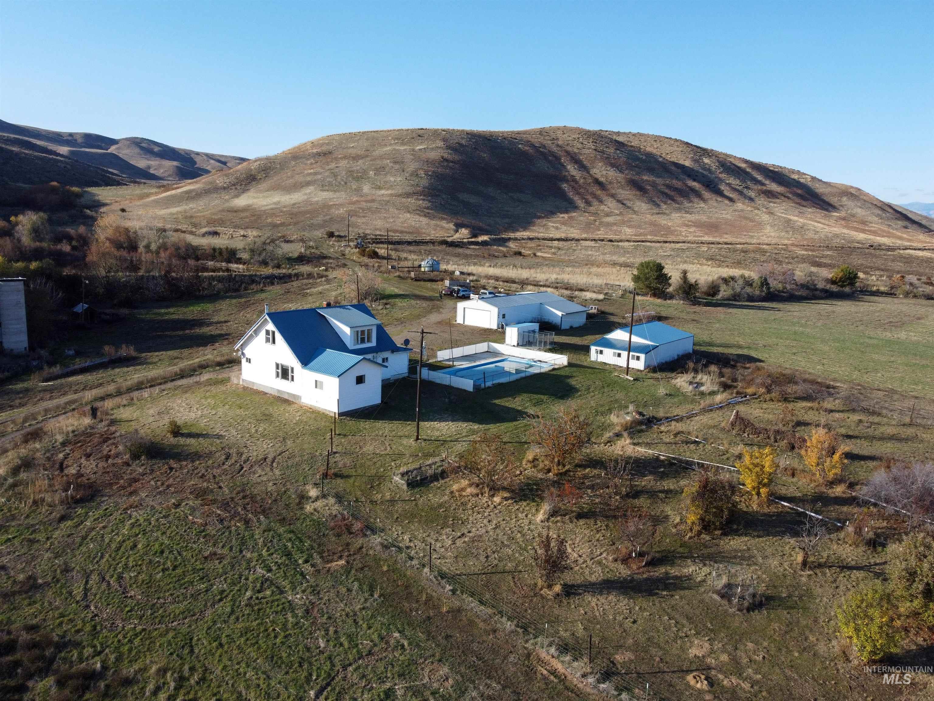 View of mountain background featuring rural landscape