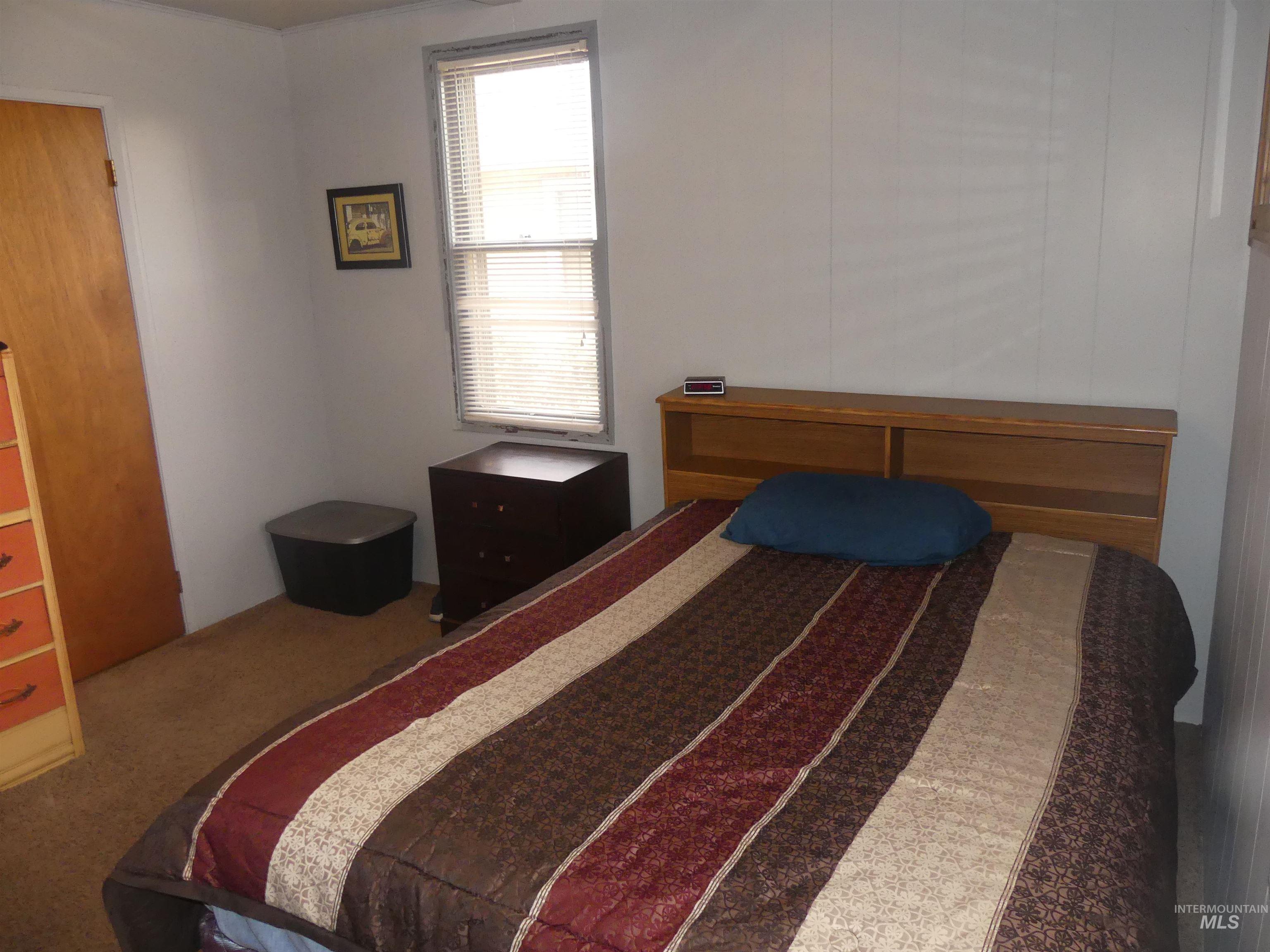 Bedroom featuring carpet flooring