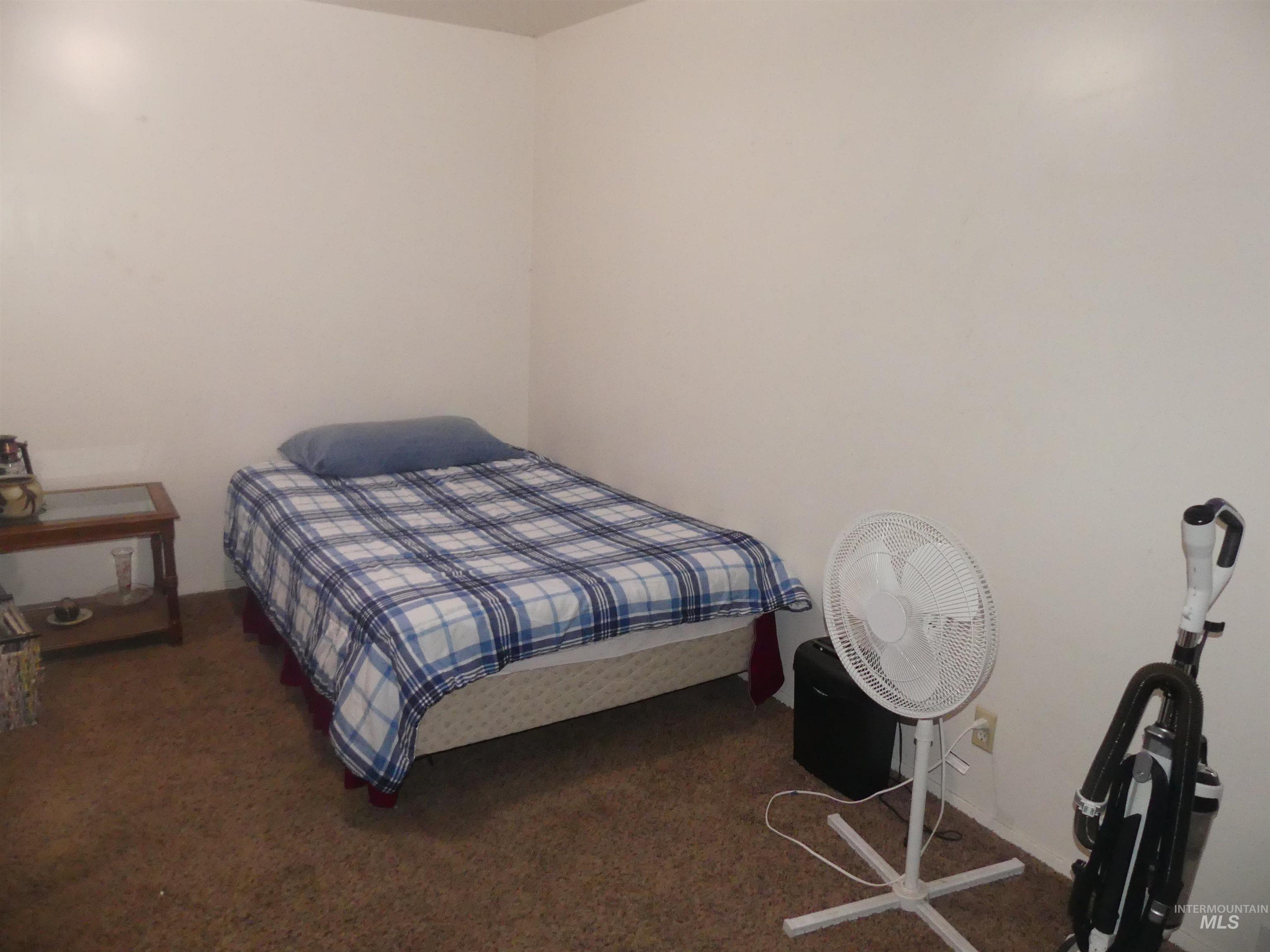 Bedroom featuring carpet flooring